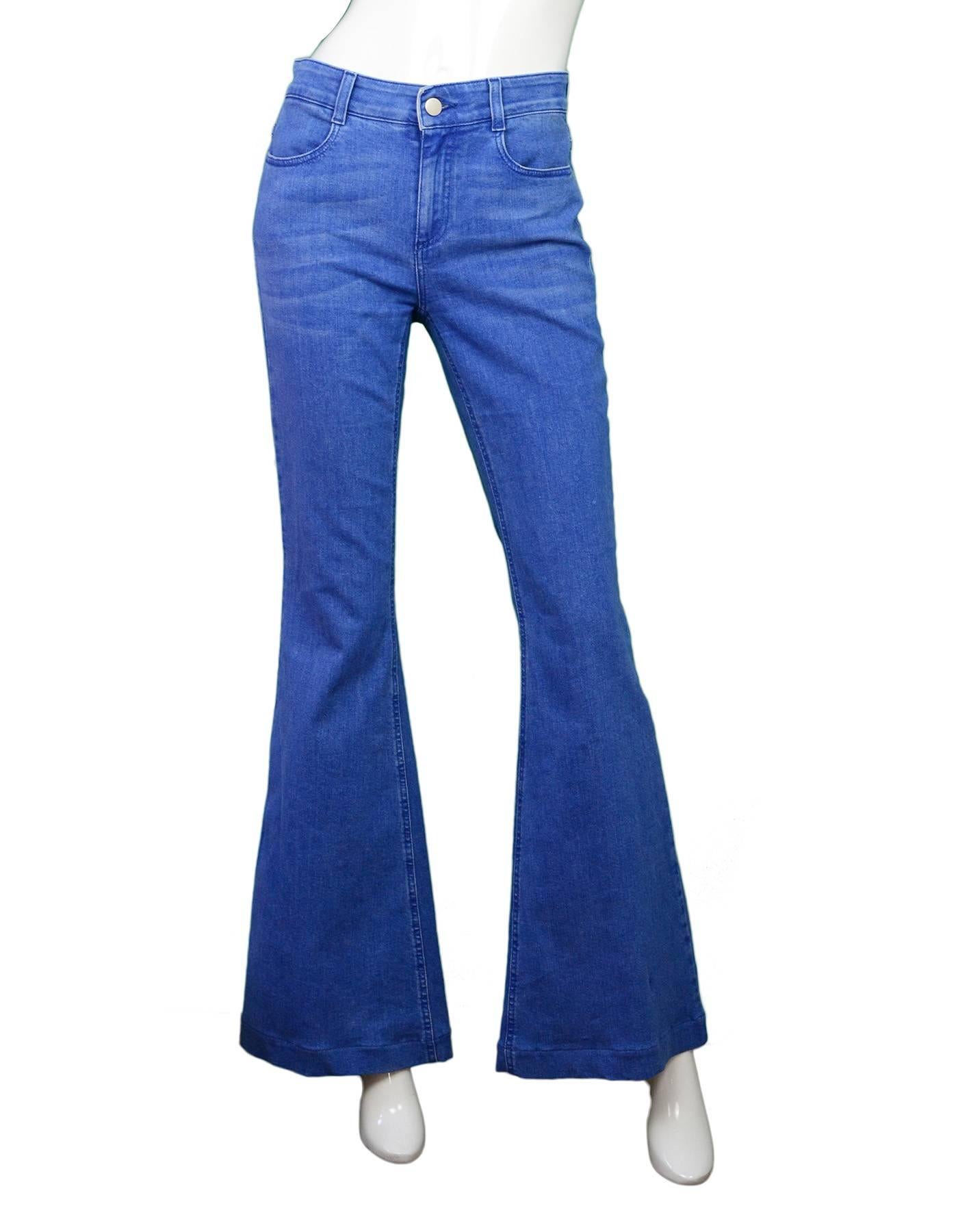 Stella McCartney Blue Flare Jeans Sz 29 

Made In: Italy
Color: Blue
Composition: 98% cotton, 2% elastane
Lining: None
Closure/Opening: Button and zip up
Exterior Pockets: Two hip pockets and two back pockets
Interior Pockets: None
Retail Price: