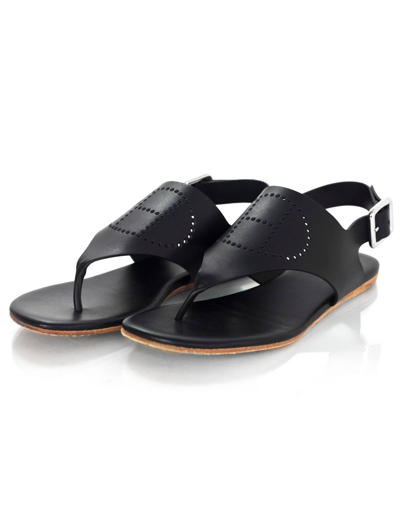 Hermes Black Leather H Sandals Sz 36

Features perforated H

Made In: Spain
Color: Black
Materials: Leather
Closure/Opening: Buckle closure at ankle
Sole Stamp: Hermes 36 Semelle Cuir Made in Spain
Overall Condition: Excellent pre-owned condition,