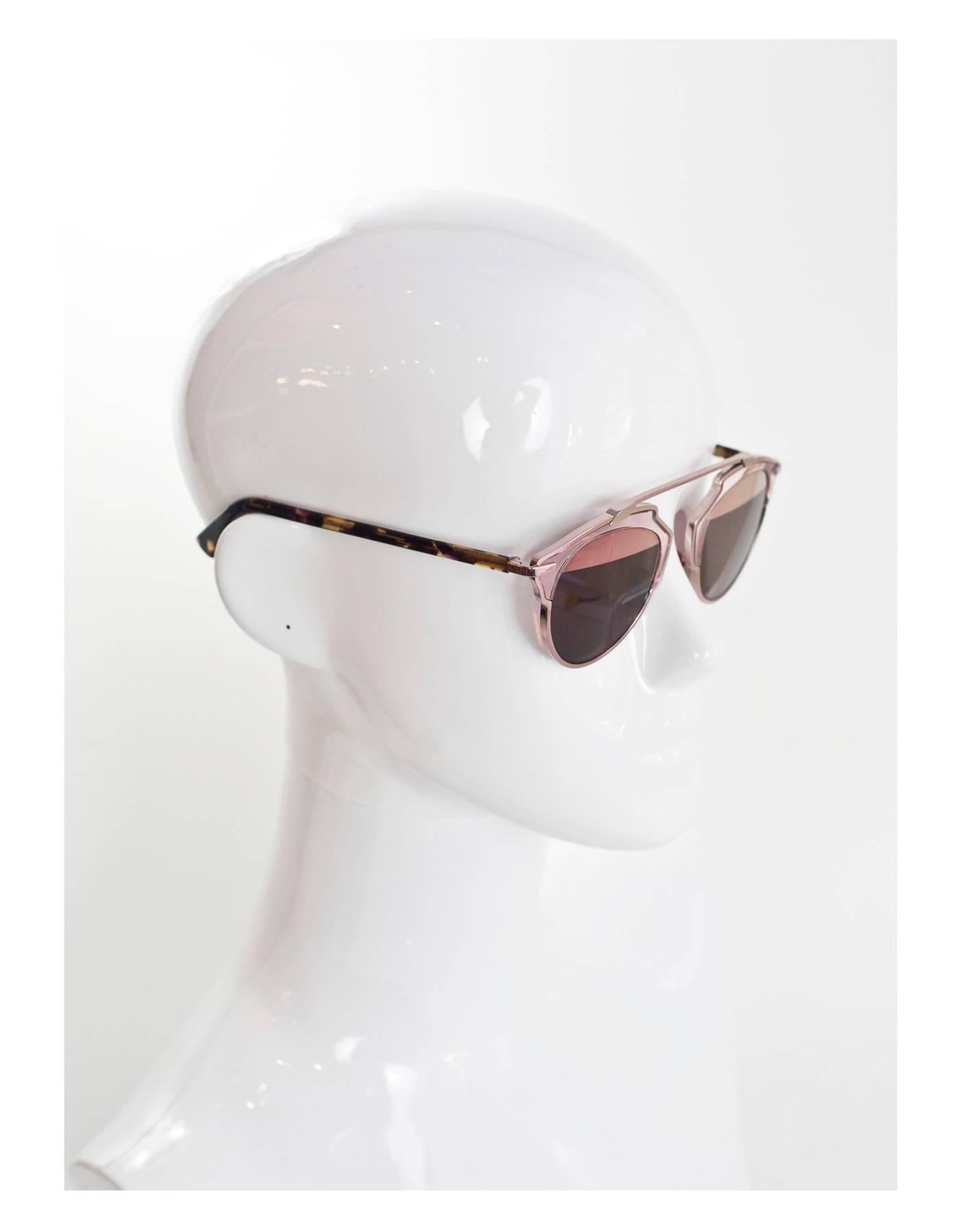 Christian Dior Rose Gold So Real Sunglasses

Made In: Italy
Color: Rose gold, tortoise
Materials: Metal, resin
Retail Price: $495 + tax
Overall Condition: Very good pre-owned condition with the exception of light scratching at lenses
Includes: