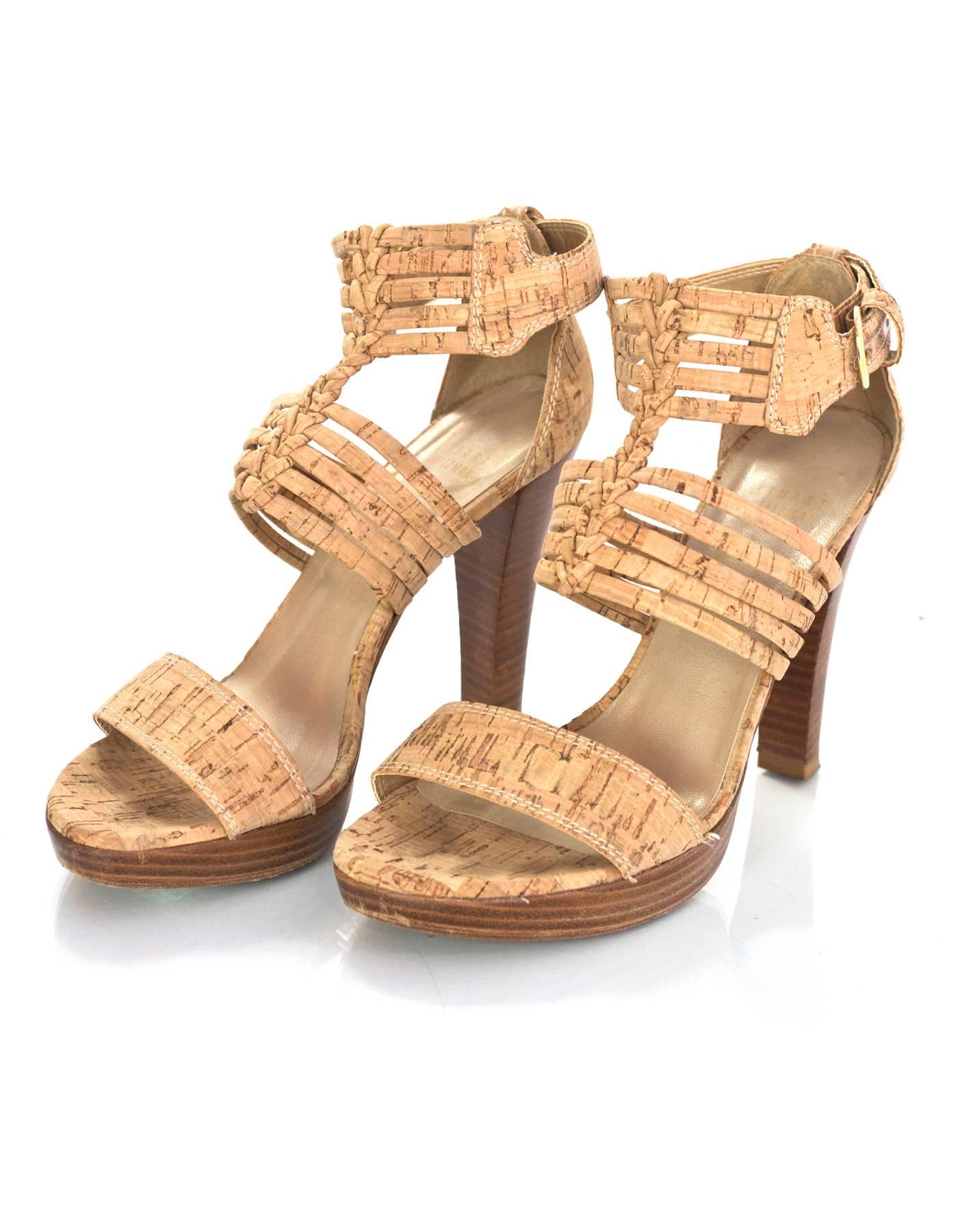 Stuart Weitzman Cork Sandals Sz 8

Color: Tan
Materials: Cork
Closure/Opening: Buckle closure at ankle
Sole Stamp: Stuart Weitzman 8
Overall Condition: Excellent pre-owned condition, minor wear at insoles and outsoles

Marked Size: 8
Heel Height: