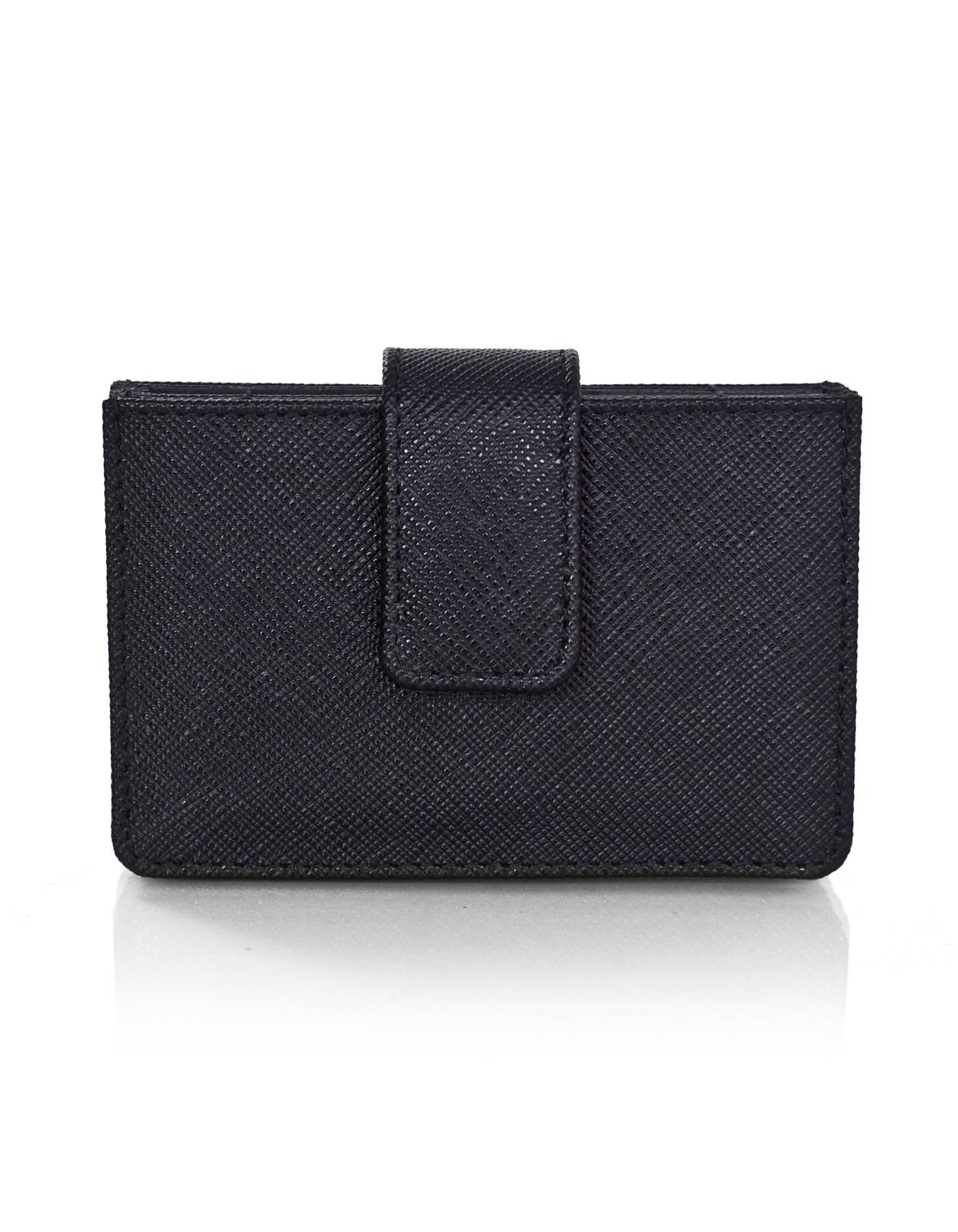 Prada Black Saffiano Accordion Card Case

Made In: Italy
Color: Black
Hardware: Goldtone
Materials: Saffiano leather
Lining: Black textile
Closure: Snap closure
Exterior Pockets: None
Interior Pockets: Five slots
Stamp: Prada Made in Italo
Retail