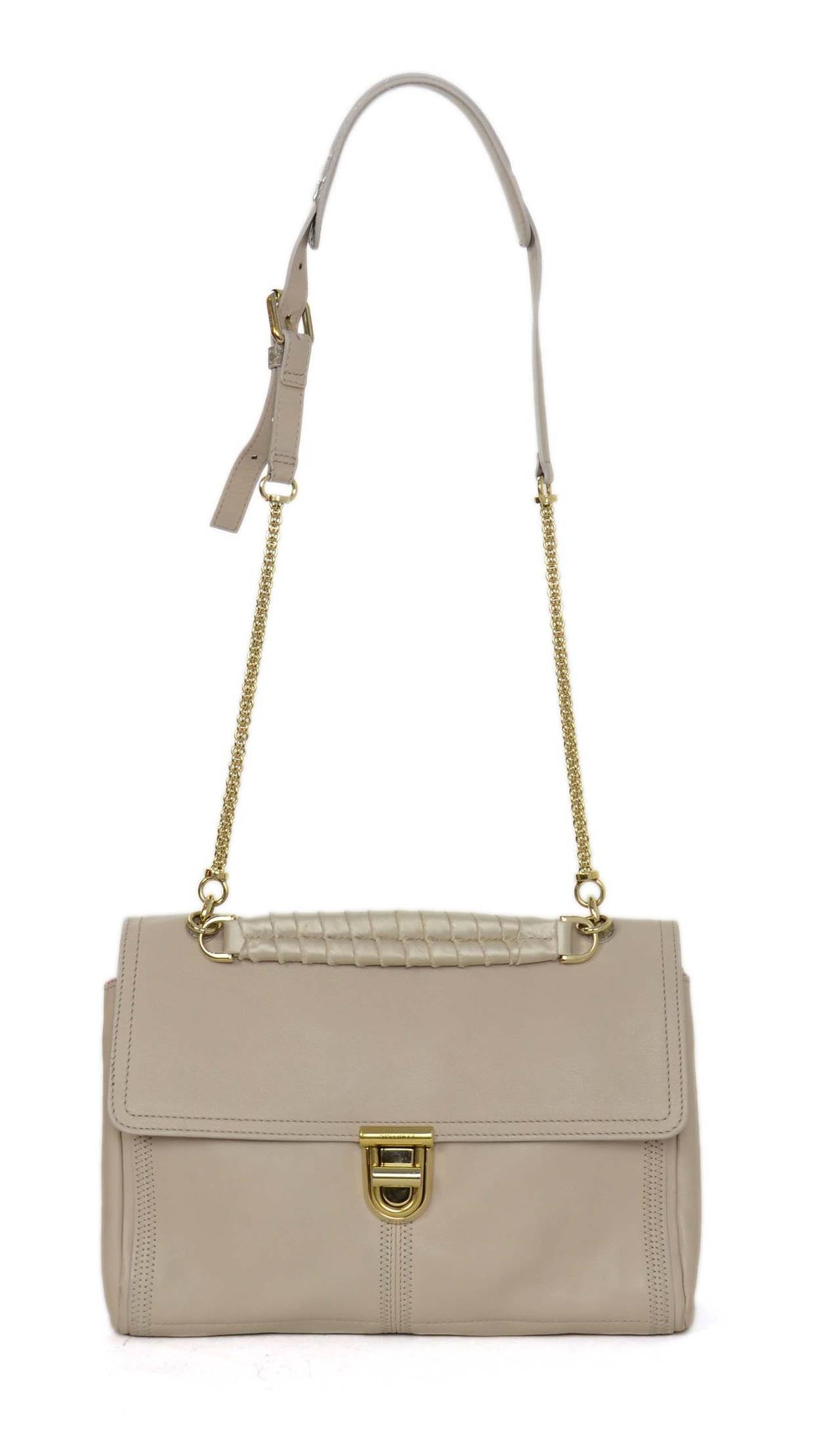 NINA RICCI Blush Leather ASAP Satchel Bag

    Made in: Italy
    Color: Blush pink
    Hardware: Antiqued gold
    Materials: Smooth leather
    Lining: Pink textile lining
    Closure/opening: Flap with a twist lock
    Exterior Pockets: