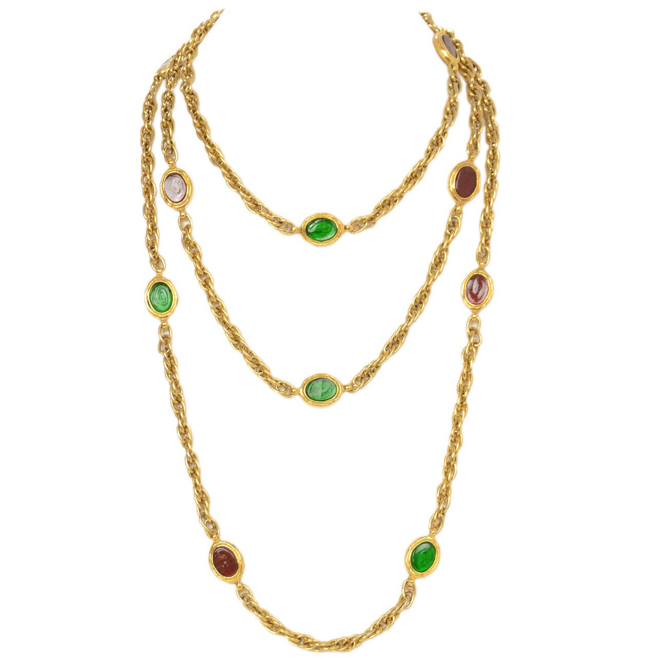 Chanel Vintage '70s-'80s Red & Green Gripoix Gold Necklace

Made in: France
Year of Production: 1970's-1980's
Closure: Jump ring
Color: Gold, red and green
Materials: Metal and glass
Overall Condition: Excellent with no signs of wear or