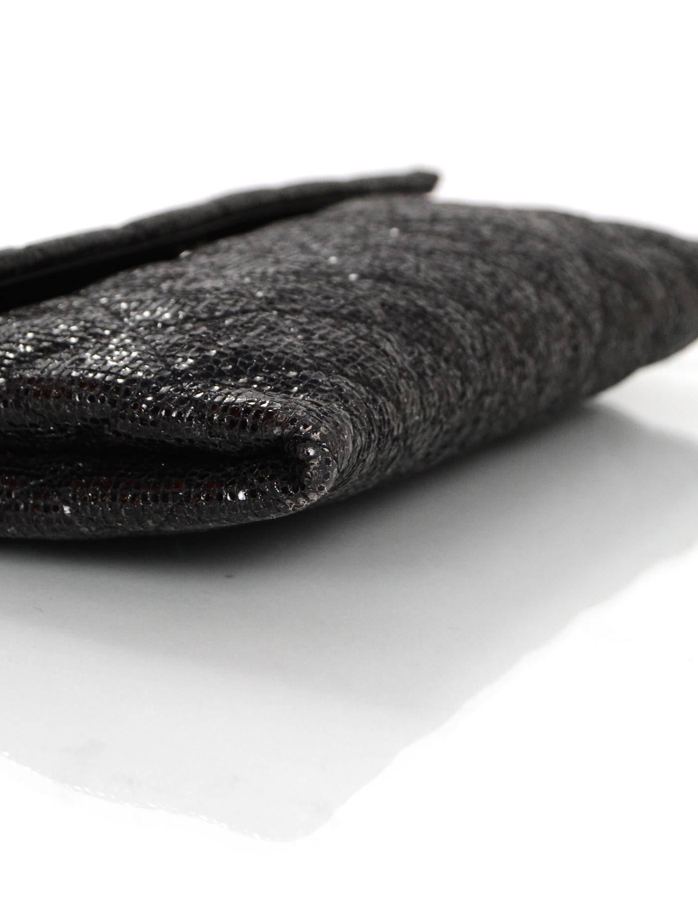 black glitter clutch bag