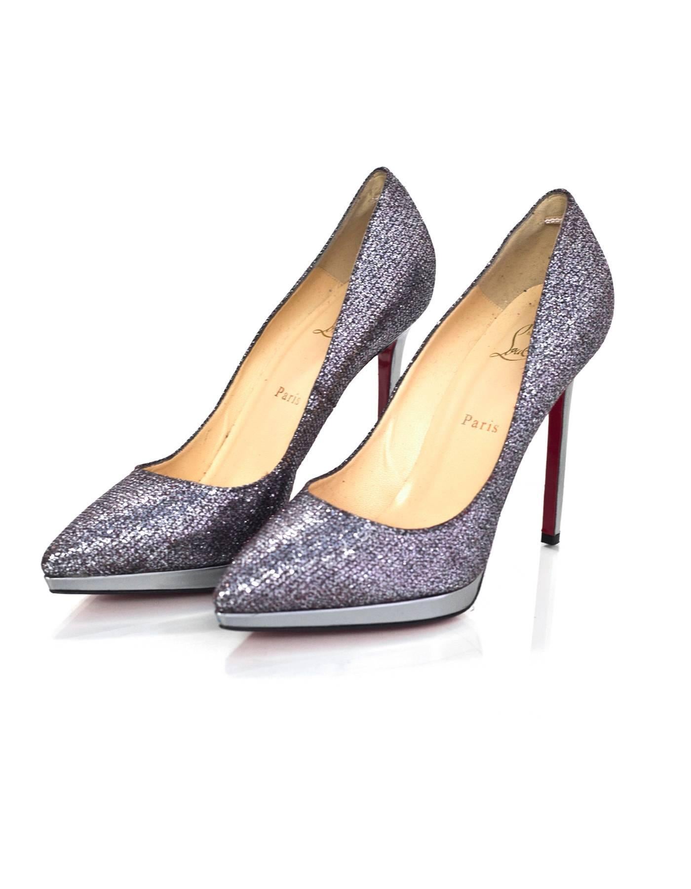 Christian Louboutin Silver Glitter Pigalle Plato 120 sz 41

Made In: Italy
Color: Silver 624/ Anthracite 1
Materials: Leather & textile
Closure/Opening: Slide on
Sole Stamp: Christian Louboutin MADE IN ITALY 41
Retail Price: $675 + tax
Overall