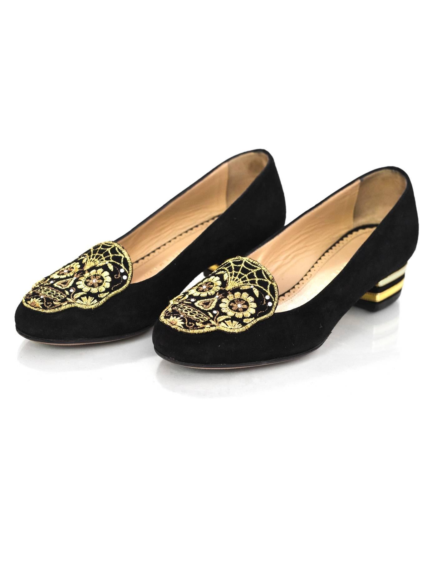 Charlotte Olympia Black Day Of The Dead Sugar Skull Loafers Sz 34

Made In: Italy
Color: Black, gold
Materials: Suede
Closure/Opening: Slide on
Sole Stamp: vero cuoio made in italy 34
Retail Price: $825 + tax
Overall Condition: Excellent pre-owned