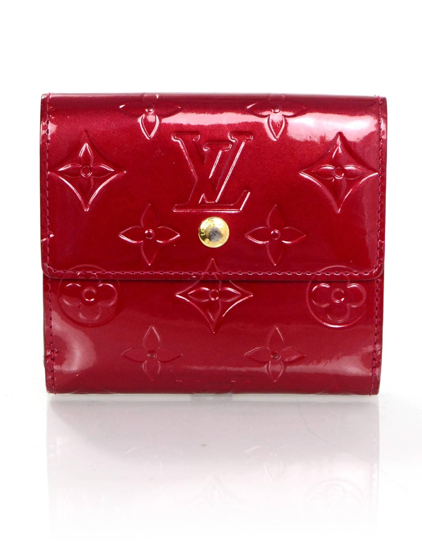 Louis Vuitton Red Pomme d'Amour Monogram Vernis Elise Wallet

Made In: France
Year of Production: 2006
Color: Red pomme d'amour
Hardware: Goldtone
Materials: Vernis leather
Lining: Red leather
Closure/Opening: Double sided with two flap top and snap