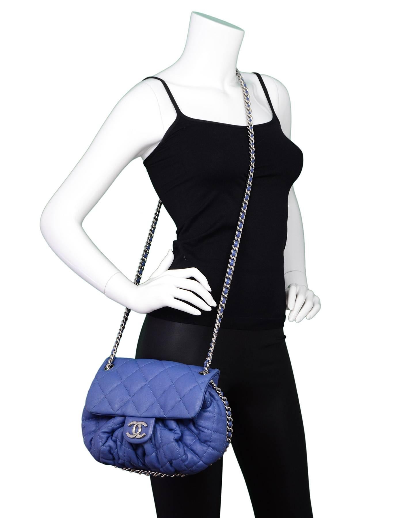 Chanel Blue Washed Lambskin Medium Chain Around Crossbody

Made In: Italy
Year of Production: 2011
Color: Blue
Hardware: Silvertone
Materials: Washed lambskin leather, metal
Lining: Cream textile
Closure/Opening: Flap top with magnetic snap