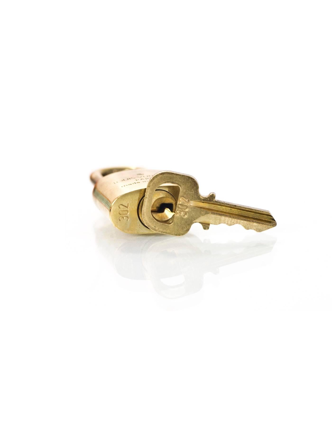 Orange Louis Vuitton Goldtone Lock & Key #302