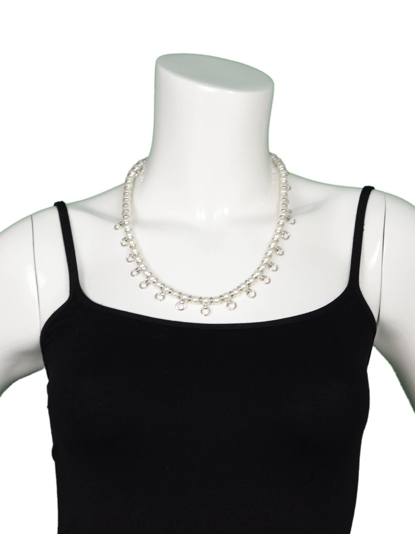 Eddie Borgo Pierced Faux Pearl Long Necklace

Color: White and silvertone
Materials: Metal and fauxx pearl
Closure: Push clasp
Stamp: Eddie Borgo
Retail Price: $435 + tax
Overall Condition: Excellent pre-owned condition 

Measurements: 
Length: