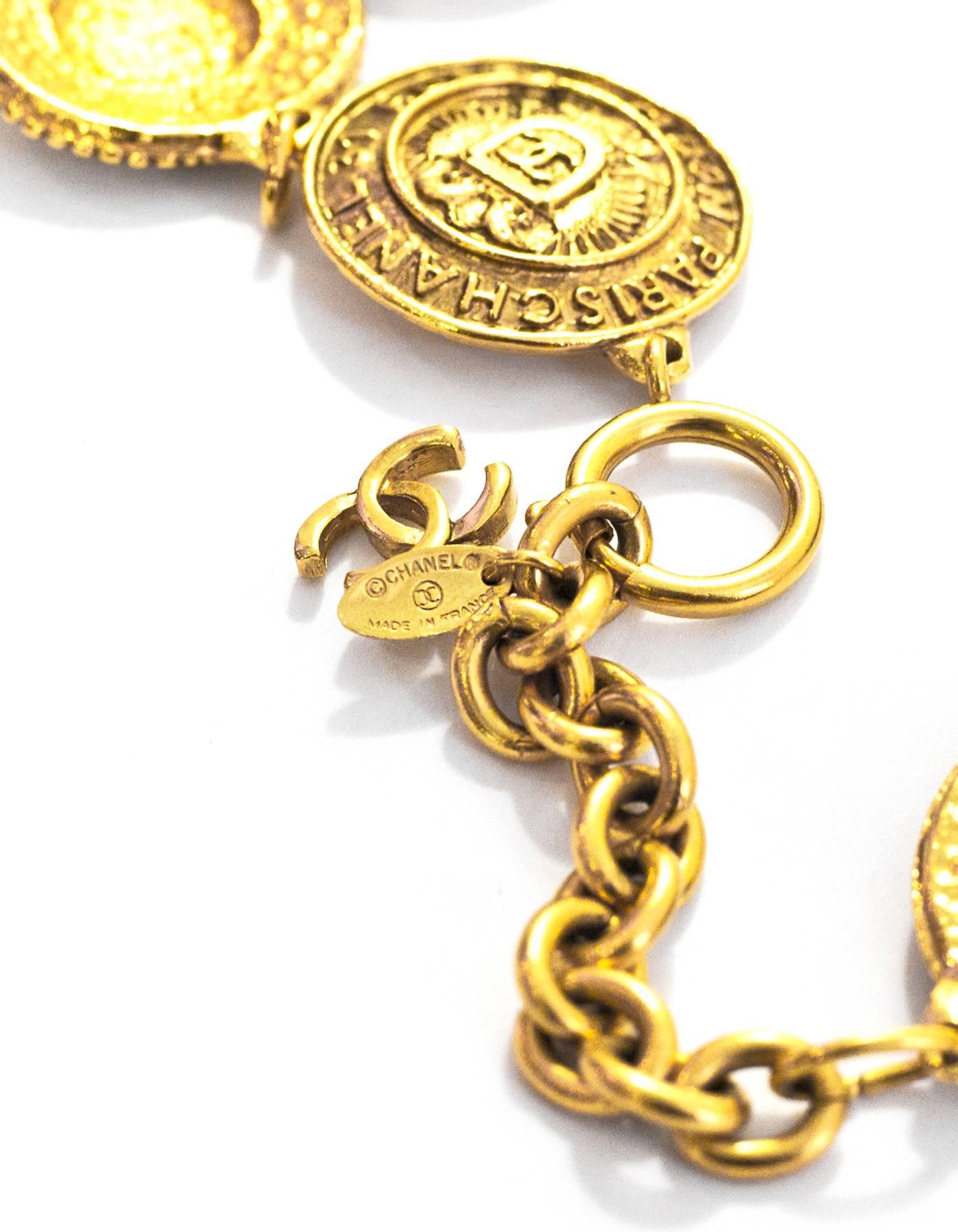 Chanel Vintage Gold Medallion Necklace

Made In: France
Year Of Production: Early 1990's
Stamp: Chanel CC Made in France
Closure: Jump ring closure
Color: Goldtone
Materials: Metal
Overall Condition: Excellent vintage pre-owned condition with the