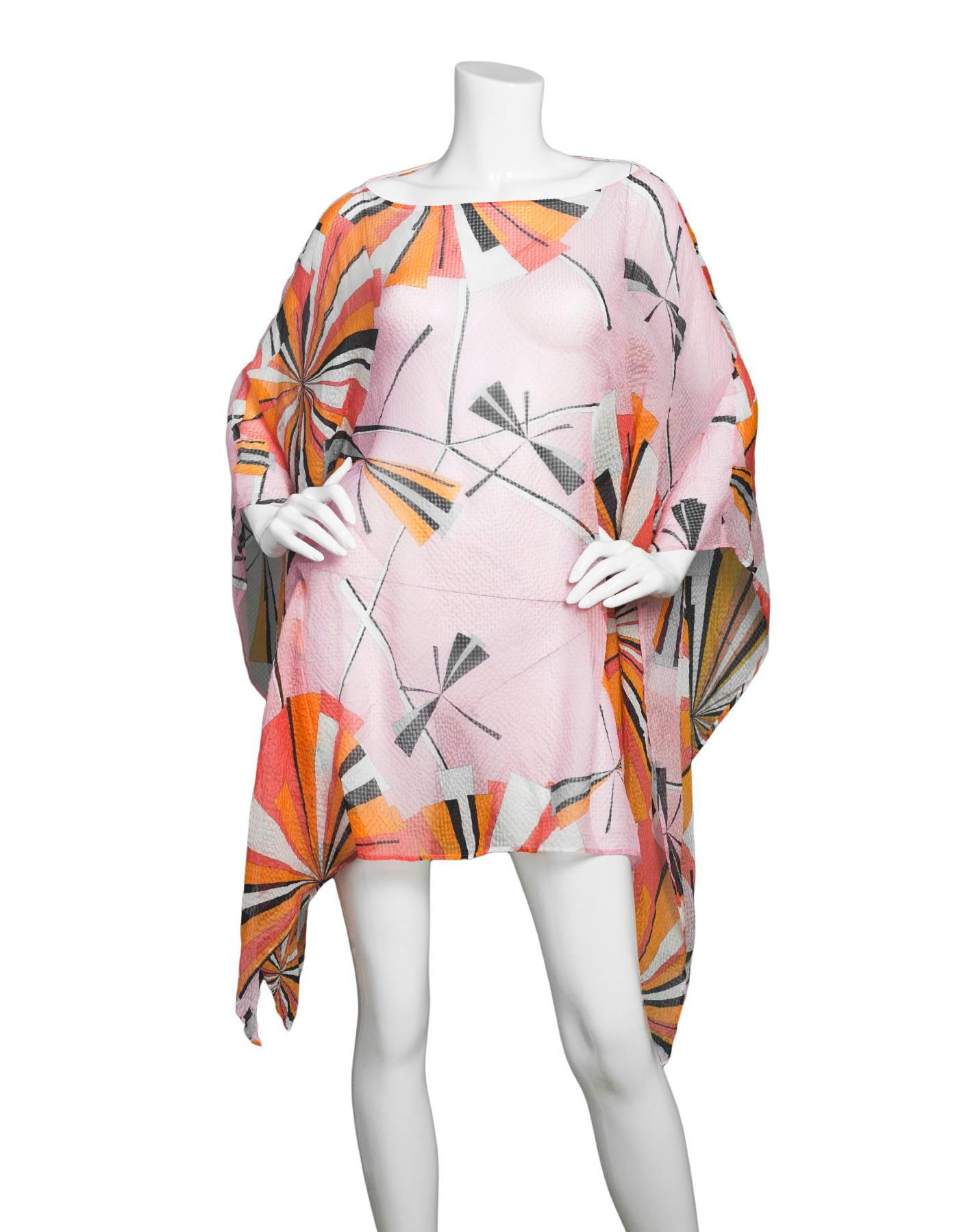 Emilio Pucci Pink Sheer Silk Kaftan Sz US4

Made In: Italy
Color: Pink, orange, black
Composition: 100% silk
Lining: None
Closure/Opening: Pull over
Overall Condition: Excellent pre-owned condition

Marked Size: US4
Bust: 36"
Waist:
