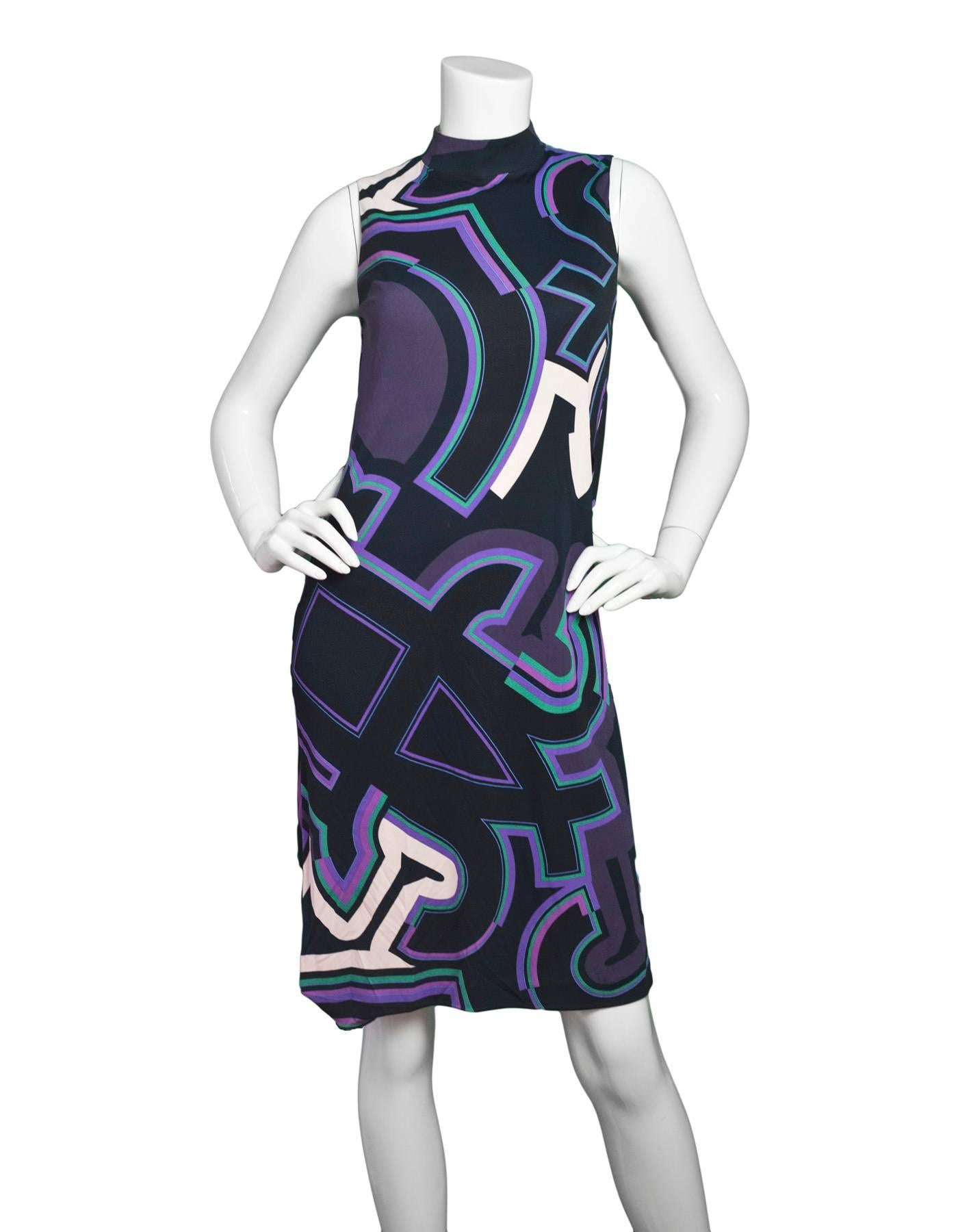 Emilio Pucci Black & Purple Sleeveless Dress Sz US4
Features belt loops

Made In: Italy
Year Of Production: 2017
Color: Purple, black, green
Composition: 83% Viscose, 17% silk
Lining: Black silk lining under bust
Closure/Opening: Zip closure at