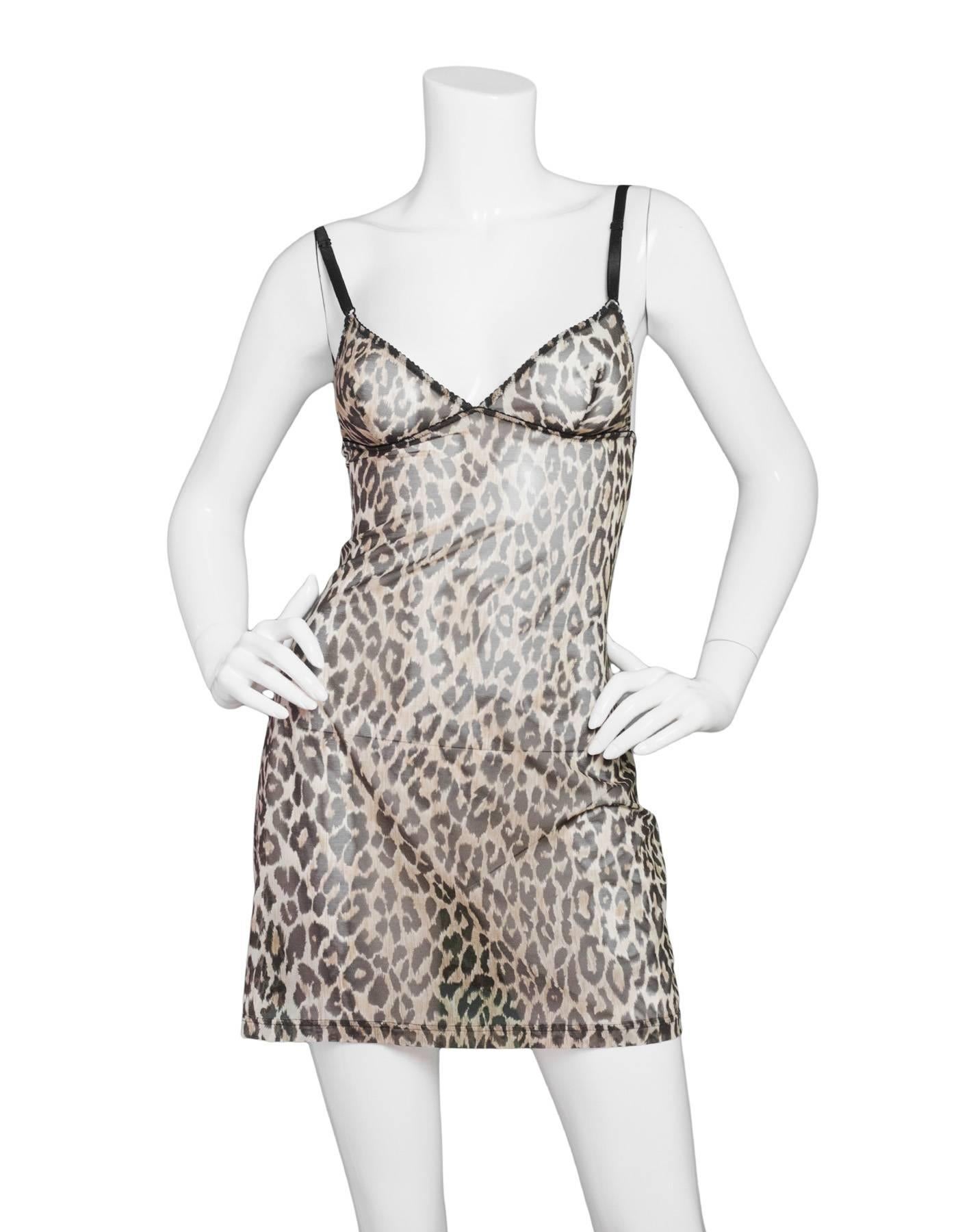 Dolce & Gabbana Sheer Leopard Print Dress Sz Small

Made In: Italy
Color: Black, brown
Composition: 80% Nylon, 20% Elastane
Lining: None
Closure/Opening: Pull over, adjustable straps
Overall Condition: Excellent pre-owned condition

Marked Size: