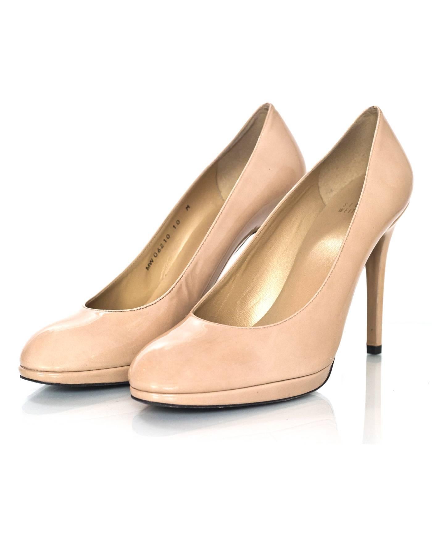 Stuart Weitzman Nude Patent Platswoon Pumps Sz 10

Made In: Spain
Color: Nude
Materials: Patent leather
Closure/Opening: Slide on
Sole Stamp: Stuart Weitzman Leather Sole Made In Spain
Overall Condition: Excellent pre-owned condition with the