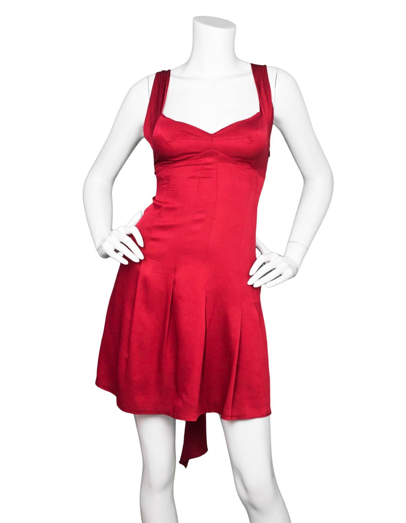 Moschino Brick Red Dress Sz US4
Features bow detail at back

Made In: Italy
Color: Brick red
Composition: Not listed, feels like silk
Lining: Red underslip
Closure/Opening: Hidden side zip closure
Overall Condition: Excellent pre-owned condition,