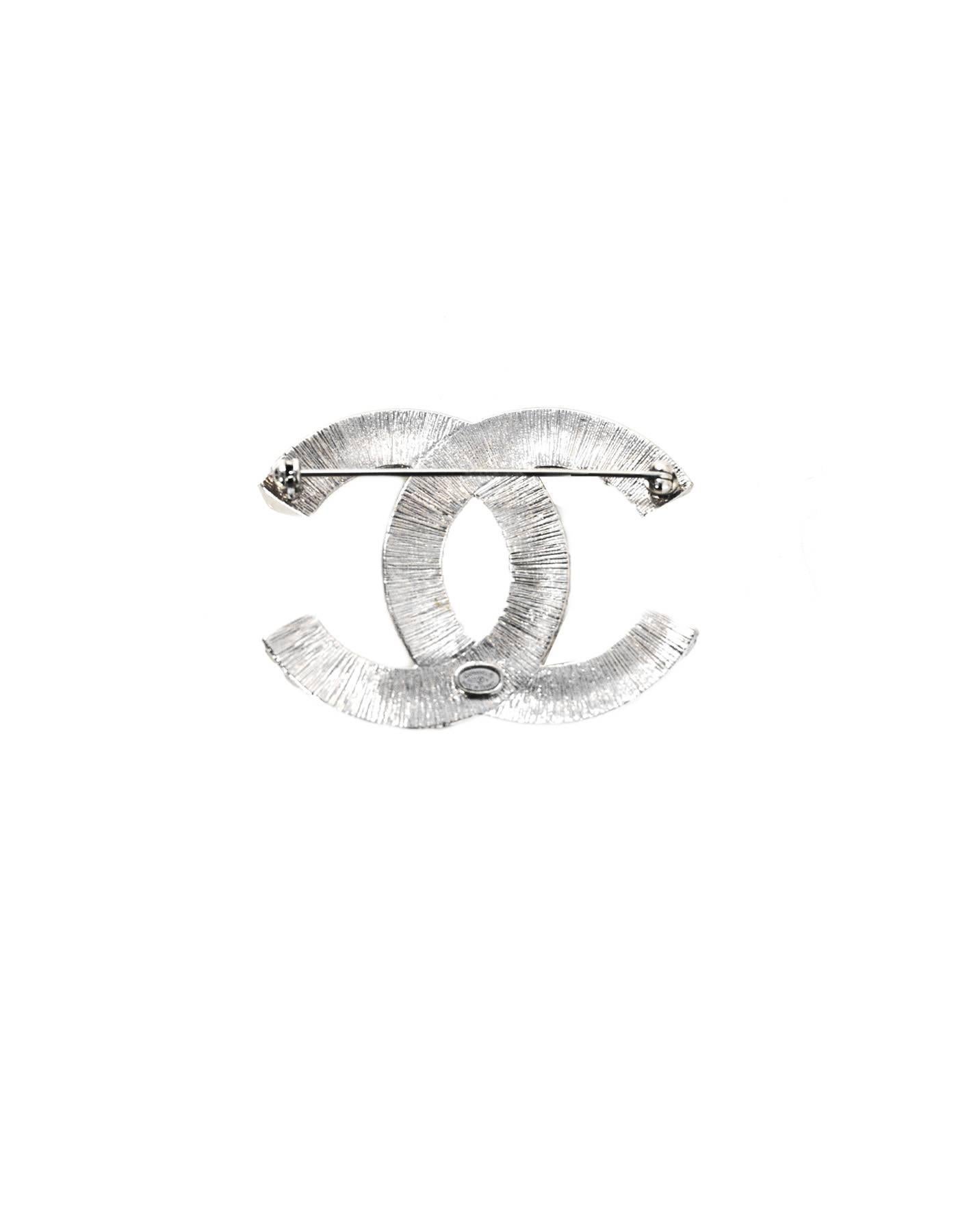 Chanel NEW '17 Crystal CC Brooch

Made In: France
Year of Production: 2017
Color: Silvertone and clear
Materials: Metal and strass crystal
Closure/Opening: Pin back closure
Stamp: A17 CC V
Overall Condition: Excellent

Measurements: 
Length: