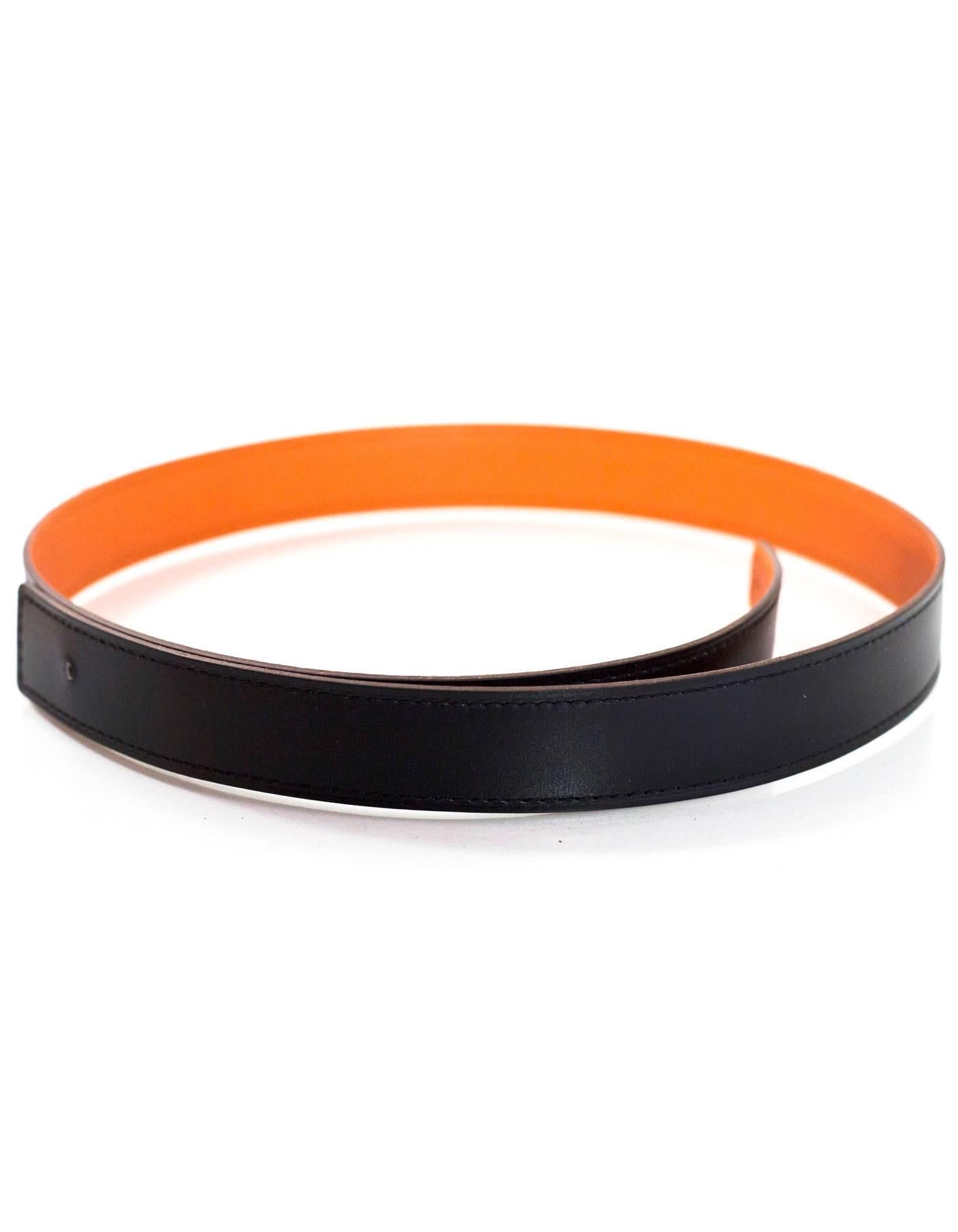 Hermes Black Swift & Orange Clemence 24mm Reversible Belt Strap
**NOTE: Belt does NOT come with H buckle seen in picture**

Made In: France
Year of Production: 2007
Color: Black and orange
Materials: Swift and clemence leather
Closure/Opening: