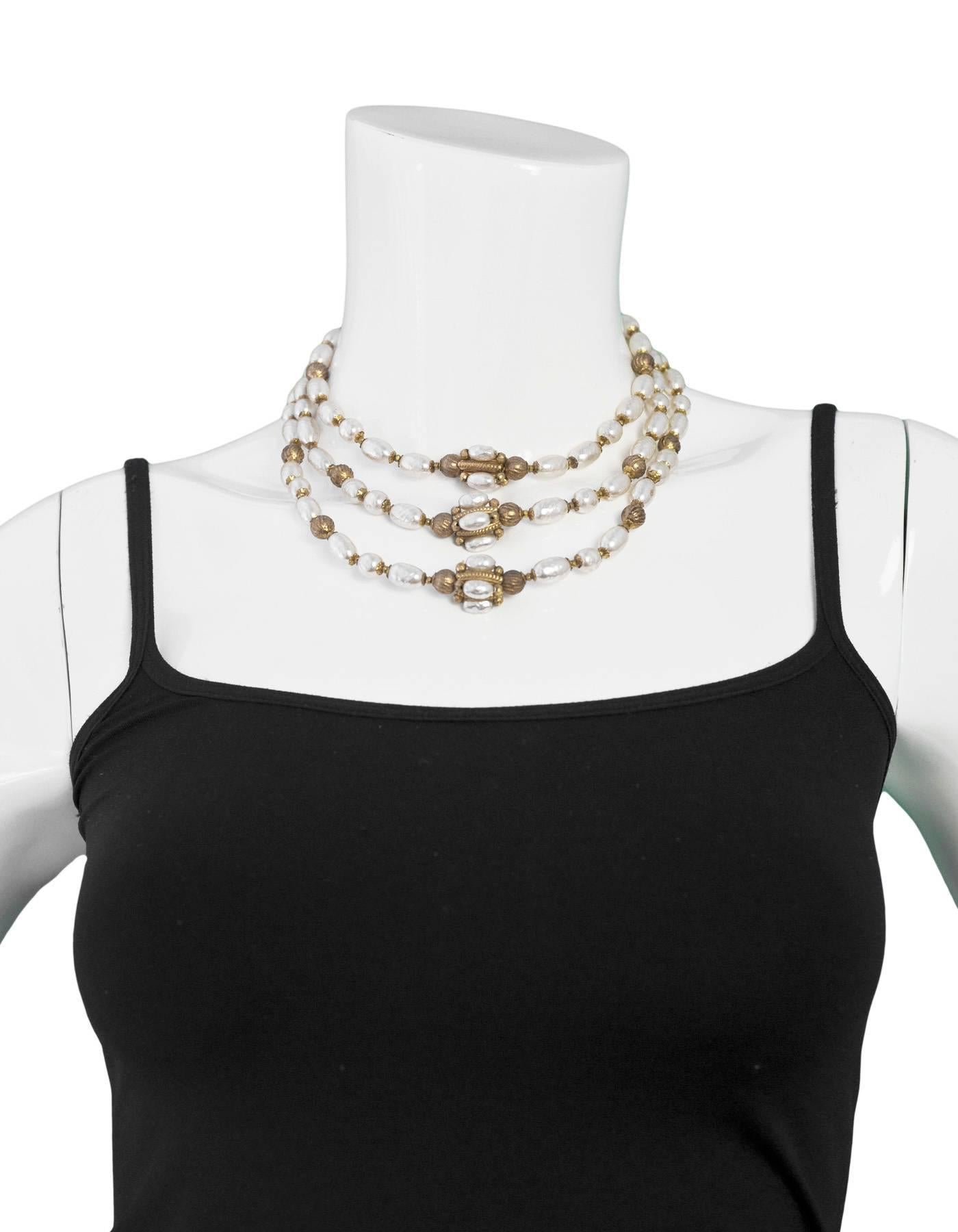 Miriam Haskell Goldtone and Faux Pearl Necklace

Color: Ivory, gold
Materials: Faux pearls, metal
Closure/Opening: Push clasp closure
Stamp: Miriam Haskell
Overall Condition: Excellent pre-owned condition, slight tarnish at metal 

Measurements: