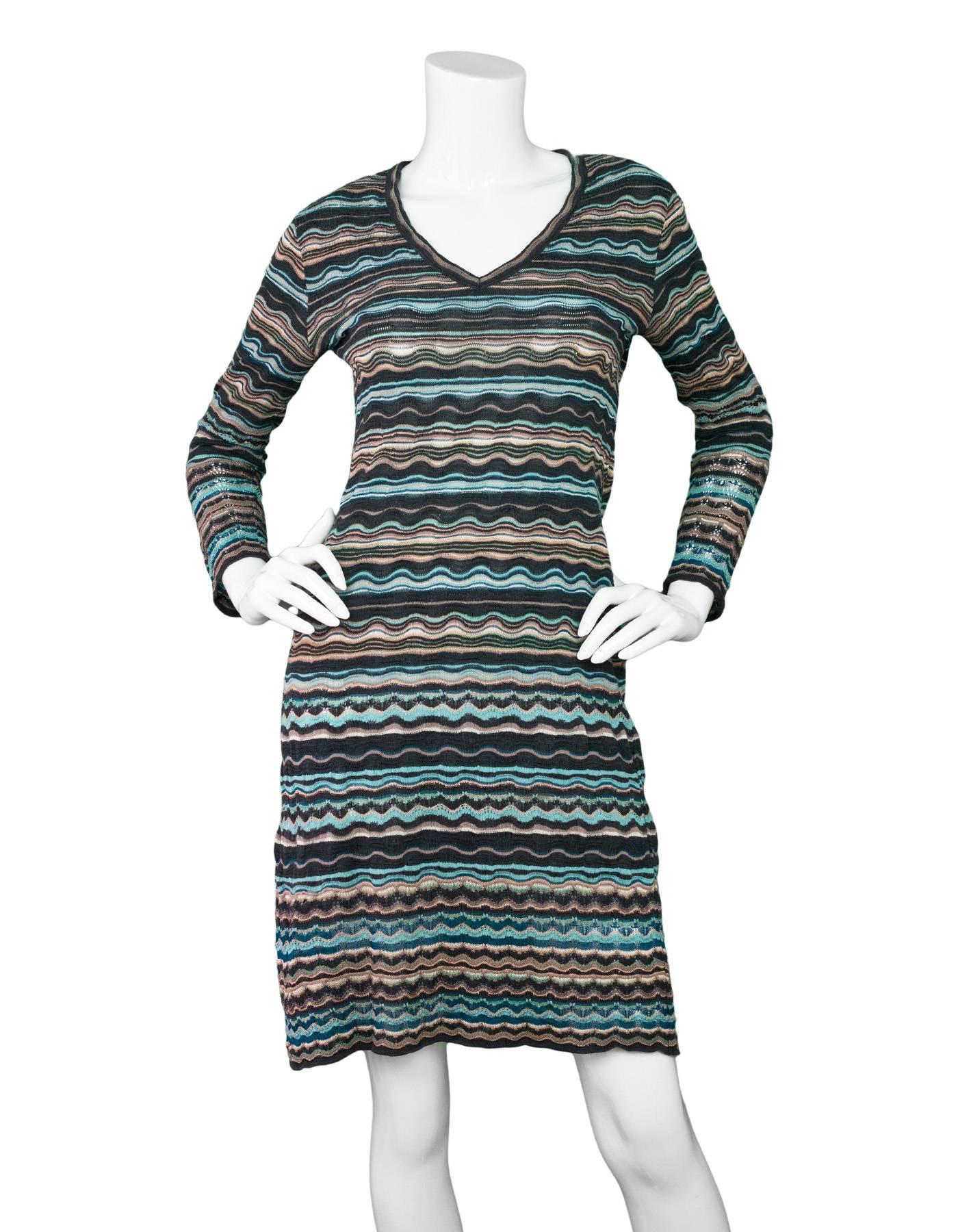 M Missoni Blue & Grey Knit Long Sleeve Dress

Made In: Italy
Color: Blue, grey, peach
Composition: 67% wool, 33% viscose
Lining: 100% polyester
Closure/Opening: Pull over
Exterior Pockets: None
Interior Pockets: None
Overall Condition: Excellent