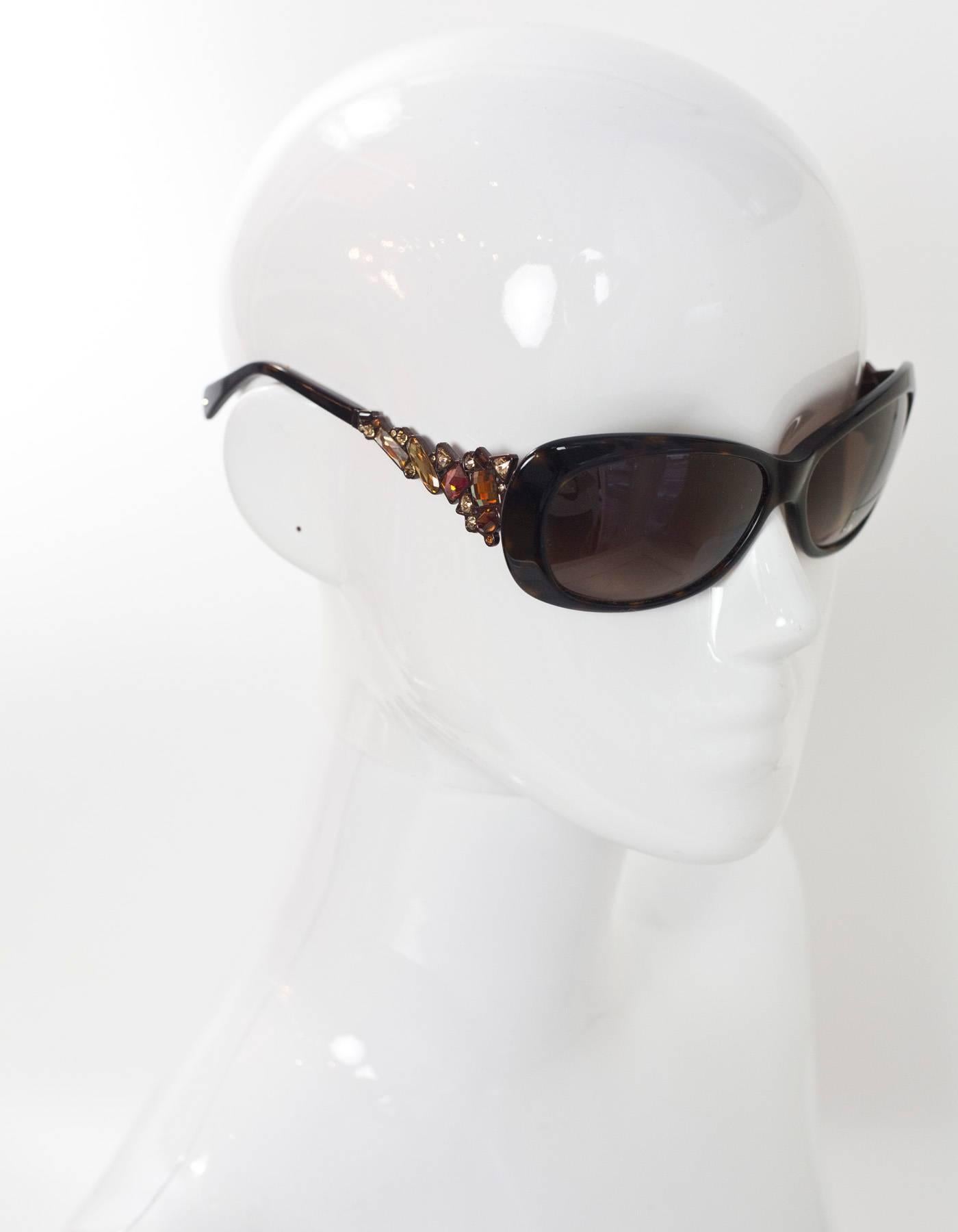 Judith Leiber Brown Tortoise Swarovski Crystal Sunglasses
Features topaz crystals at arms

Made In: Japan
Color: Brown/tortoise
Materials: Resin, crystal
Retail Price: $620 + tax
Overall Condition: Excellent pre-owned condition
Includes: Judith