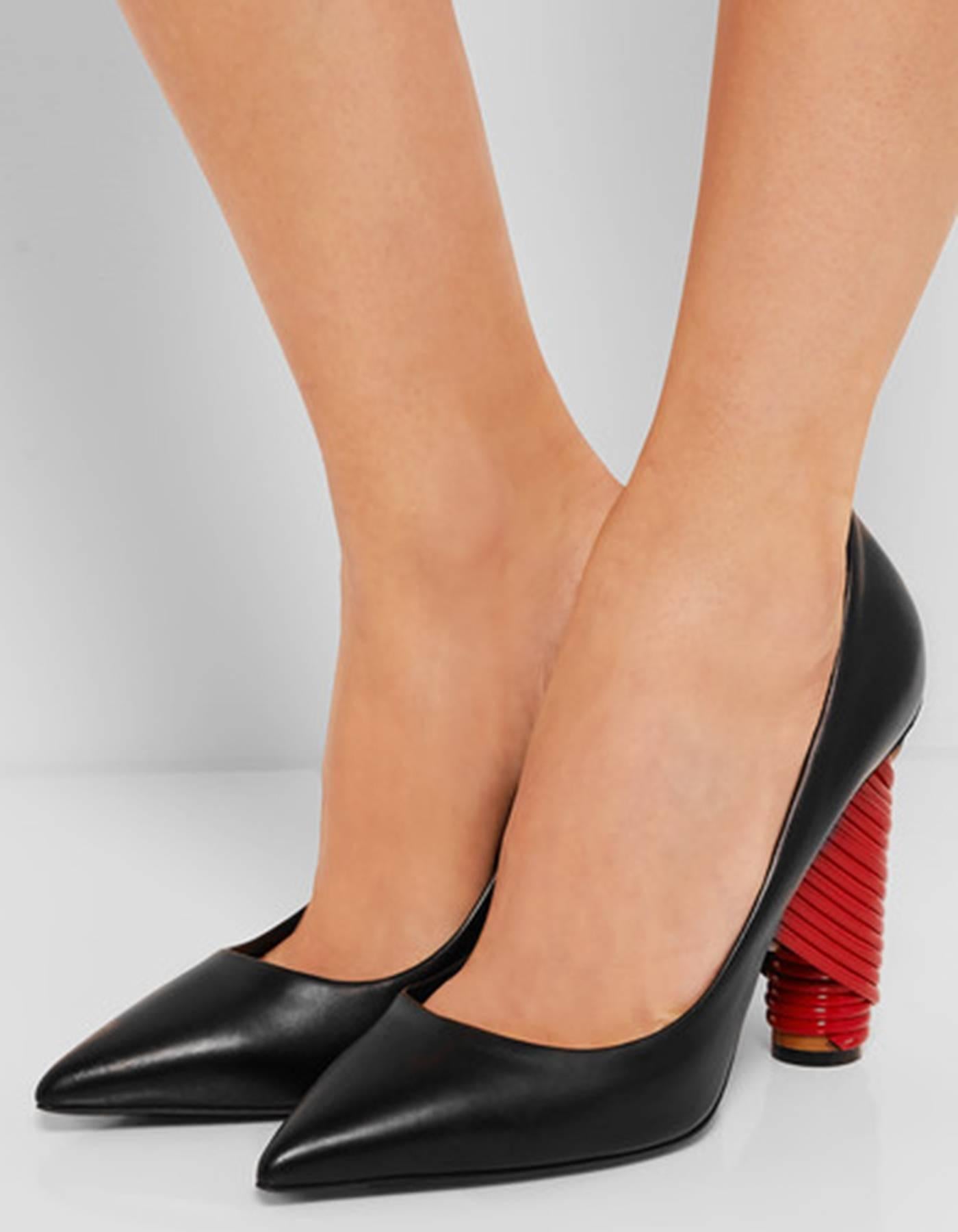 Balenciaga Black Leather Bistrot Pumps 
Features red and tan wrapped block heels

Made In: Italy
Color: Black
Materials: Leather
Closure/Opening: Slip on
Sole Stamp: Balenciaga 37 Made in Italy
Overall Condition: Excellent pre-owned