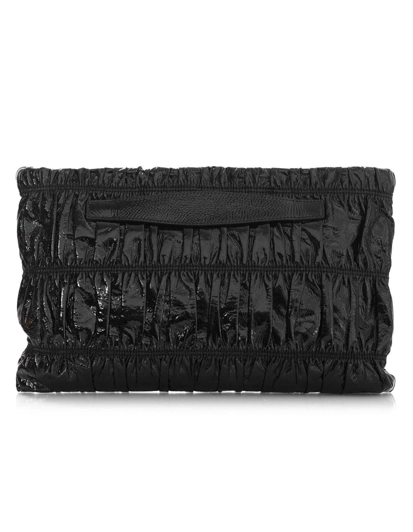 black patent leather clutch bag