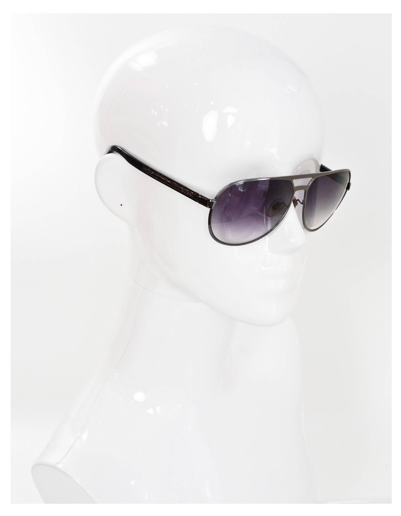 Gucci Black Aviator Sunglasses

Made In: Italy
Color: Black
Materials: Resin, metal
Overall Condition: Excellent pre-owned condition

Measurements:
Length Across: 5.55"
Lense: 2.5"
Arms: .5"