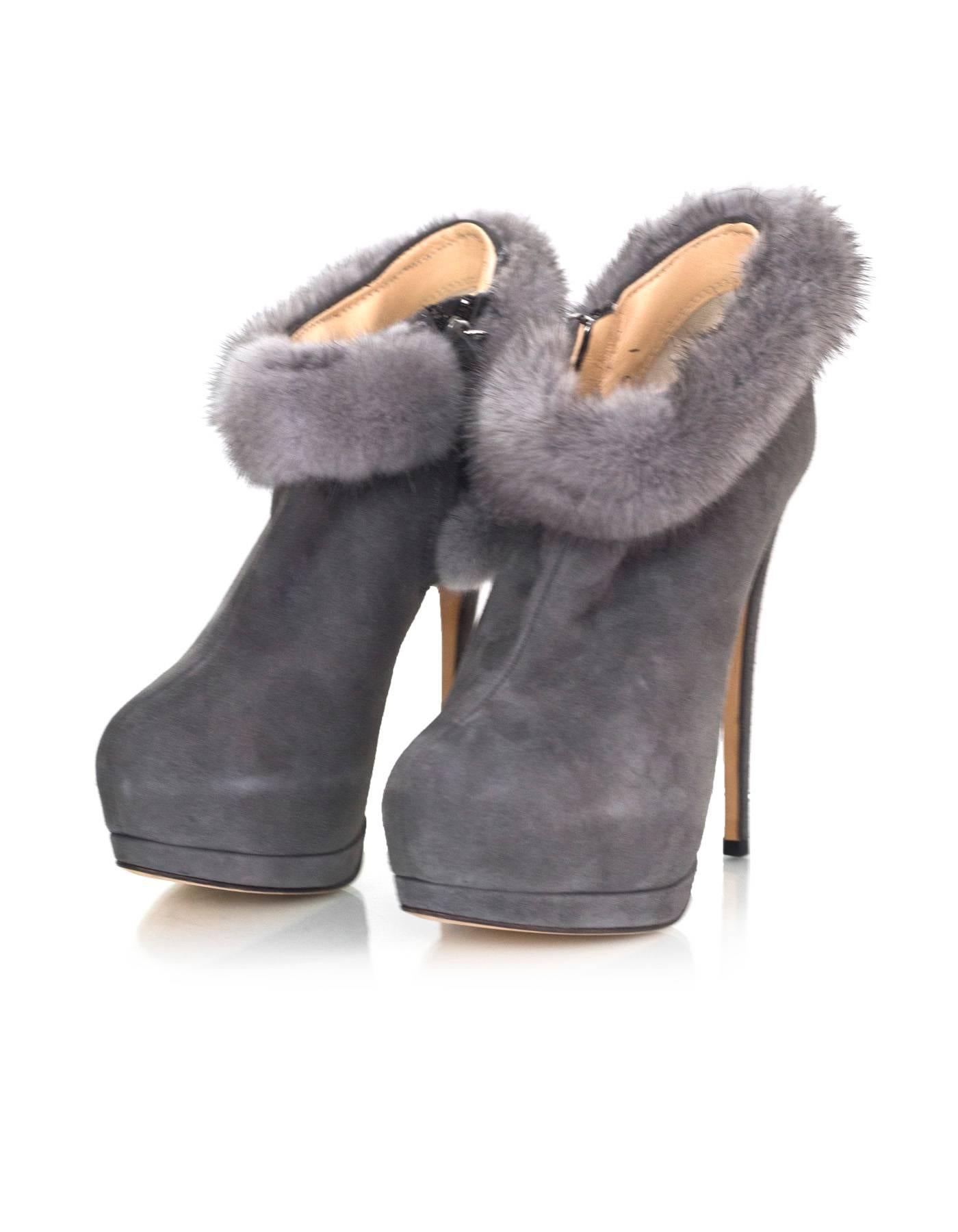 Giuseppe Zanotti Grey Suede and Fur Bootie Sz 36 
Features hidden platform

Made In: Italy
Color: Grey
Materials: Suede, fur
Closure/Opening: Side zip closure
Sole Stamp: Vero Cuoio Made in Italy 36
Overall Condition: Excellent- appear to have not