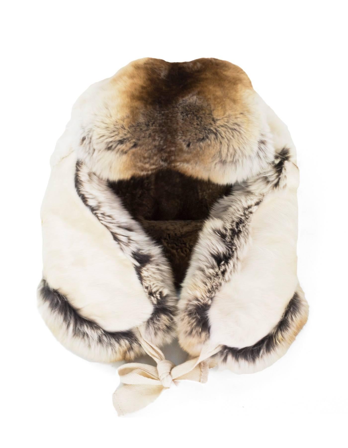 Lanvin Chinchilla & Lamb Fur Trapper Hat Sz 58
Features wool & cashmere interior lining

Made In: Italy
Color: Brown, ivory
Materials: Chinchilla, lamb / Lining: 95% wool, 5% cashmere
Overall Condition: Excellent pre-owned condition wth the