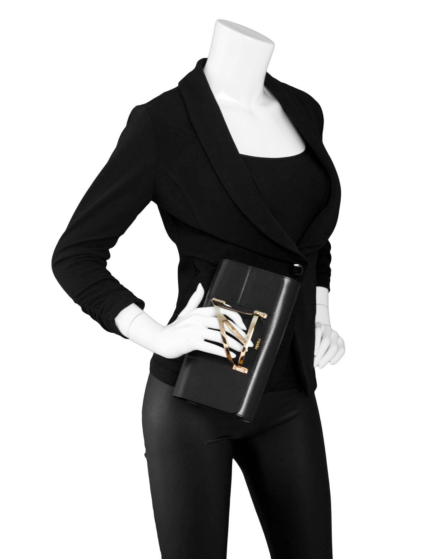 Perrin Black Leather L'Eiffel Cage Glove Clutch

To be worn with right hand

Color: Black, gold
Materials: Leather, metal
Lining: Black lambskin leather
Closure/opening: Flap top with magnetic closure
Exterior Pockets: None
Interior Pockets: One