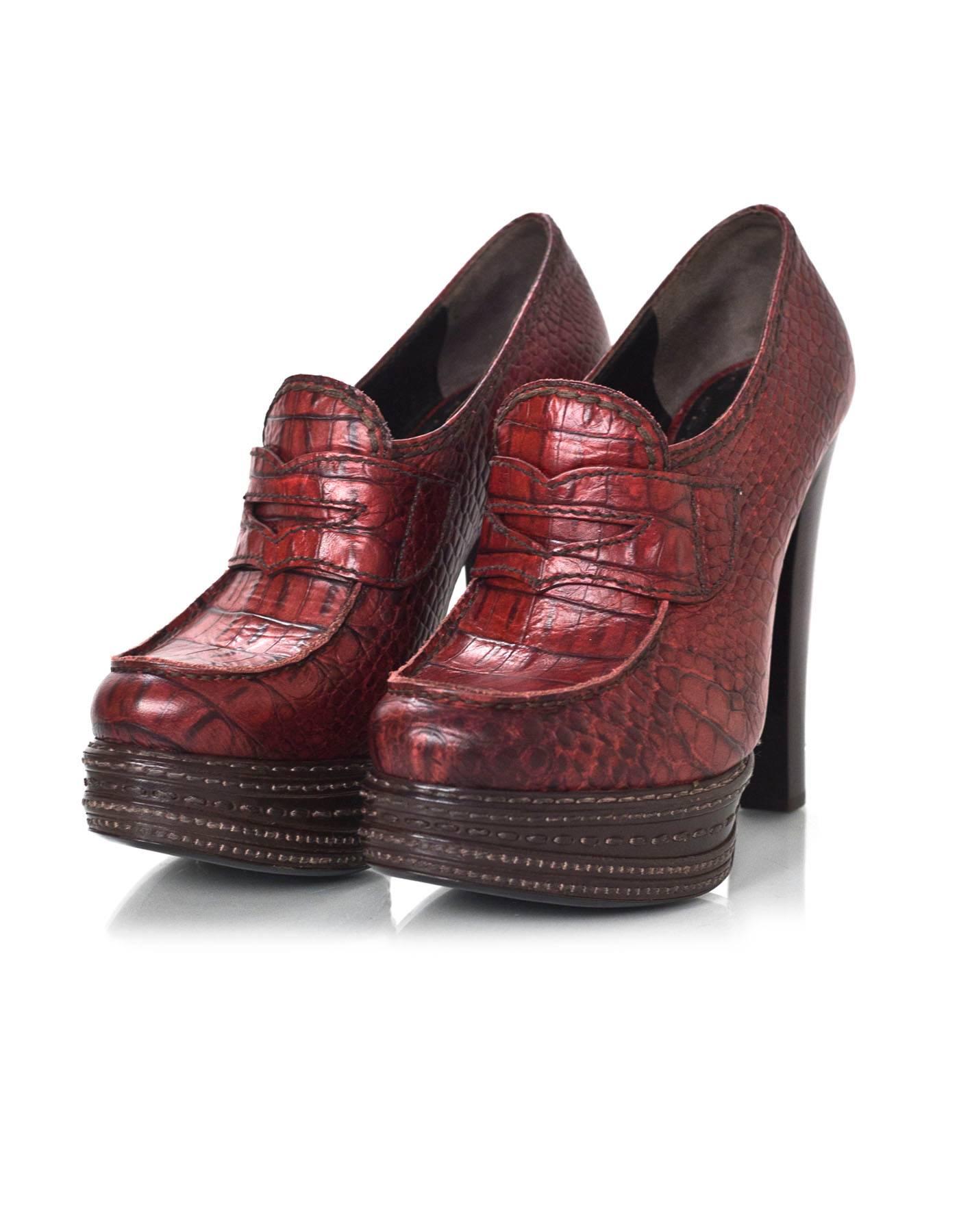 Prada Red Embossed Crocodile Platform Loafers Sz 38.5

Made In: Italy
Color: Red
Materials: Embossed leather
Closure/Opening: Slip on
Sole Stamp: Prada 38.5 Made in Italy
Overall Condition: Excellent pre-owned condition, dont appear to have been