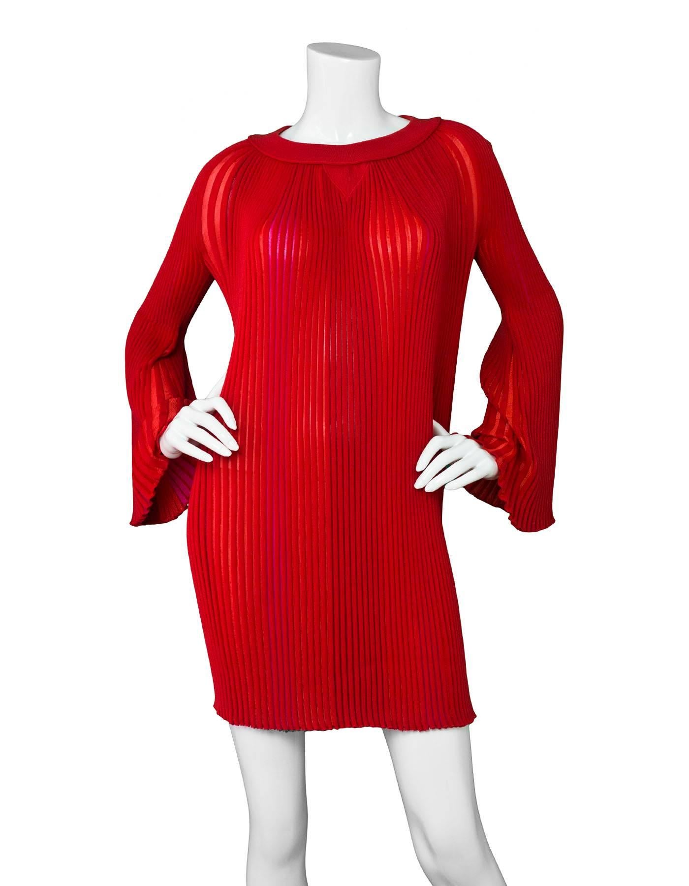 Sonia Rykiel Red Pleated Dress Sz Small

Color: Red
Composition: Not listed, feels like cotton blend
Lining: None
Closure/Opening: Pull over
Overall Condition: Excellent pre-owned condition
Marked Size: Small
Bust: 33"
Waist: 24"
Hips: