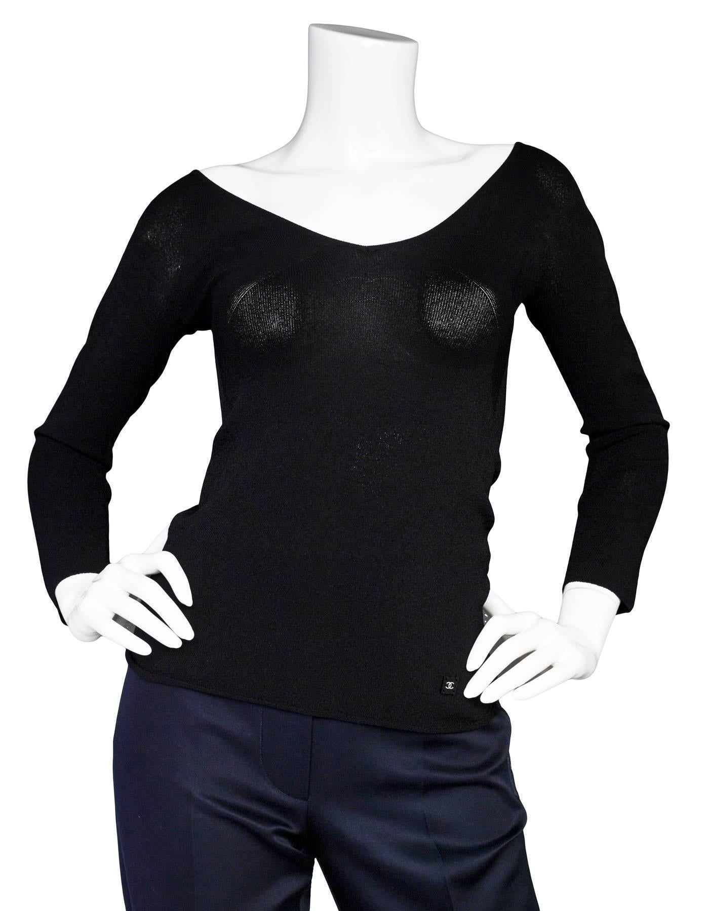 Chanel Black Top Sz FR38

Made In: Italy
Year of Production: 2002
Color: Black
Composition: 75% Rayon,25% polyester
Closure/Opening: Pull over 
Overall Condition: Excellent pre-owned condition, small pull at sleeve

Marked Size: FR38/ US 4, 6
Bust: