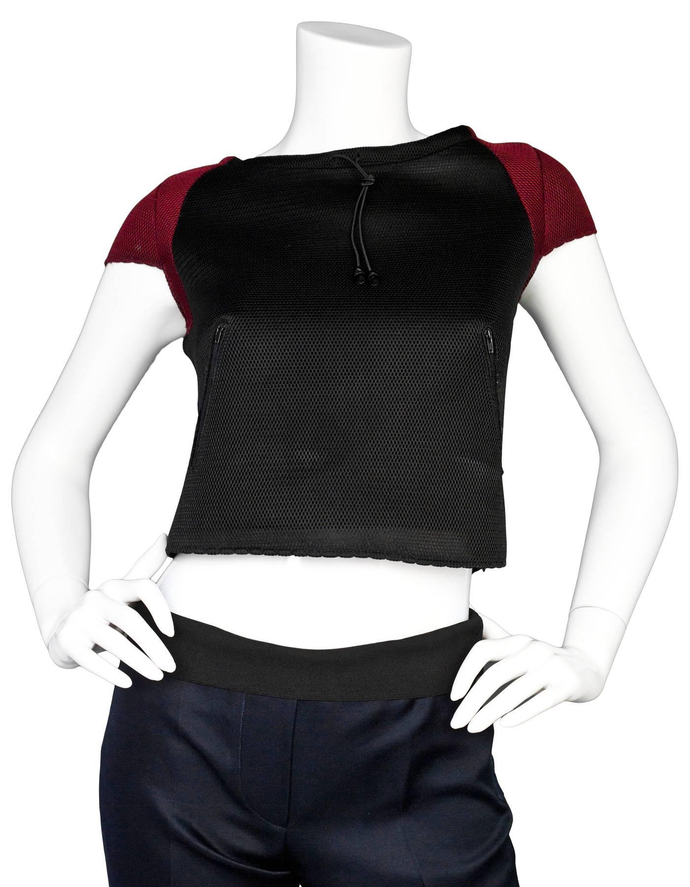 Miu Miu Black and Red Mesh Cop Top Sz IT40

Made In: Italy
Color: Black, red
Composition: 100% Polyester
Closure/Opening: Side zip closure
Overall Condition: Excellent pre-owned condition, minor soiling at front and hem

Marked Size: IT 40 / US2,
