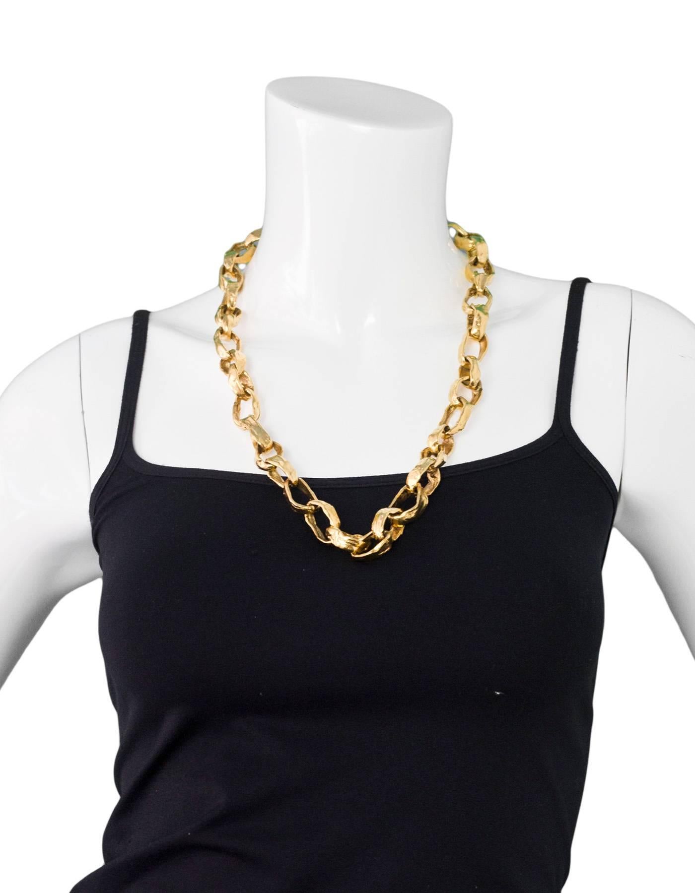 Goosens Goldtone Chain-Link Necklace

In the 1950's, Robert Goossens worked with Coco Chanel to design jewelry to accompany her fashion designs.  Goossens would create original pieces for Mademoiselle Chanel made of real gold and genuine stones,