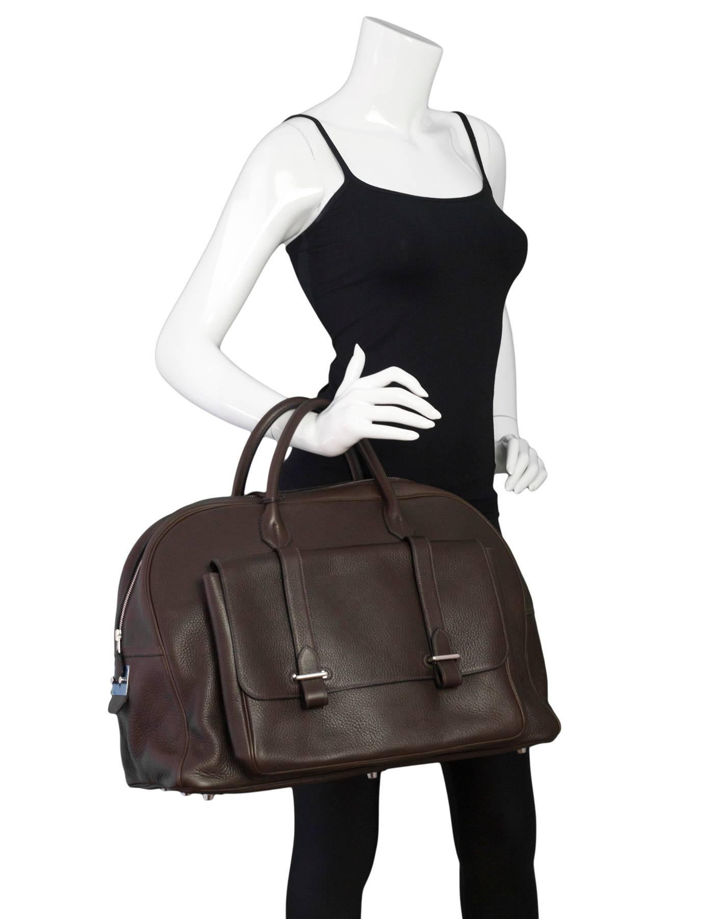 Hermes Cacao Brown Clemence Leather Steve 45 Travel Bag NEW

Made In: France
Year of Production: 2008
Color: Brown
Hardware: Palladium
Materials: Clemence leather
Lining: Tan textile
Closure/Opening: Zip top
Exterior Pockets: Front flap