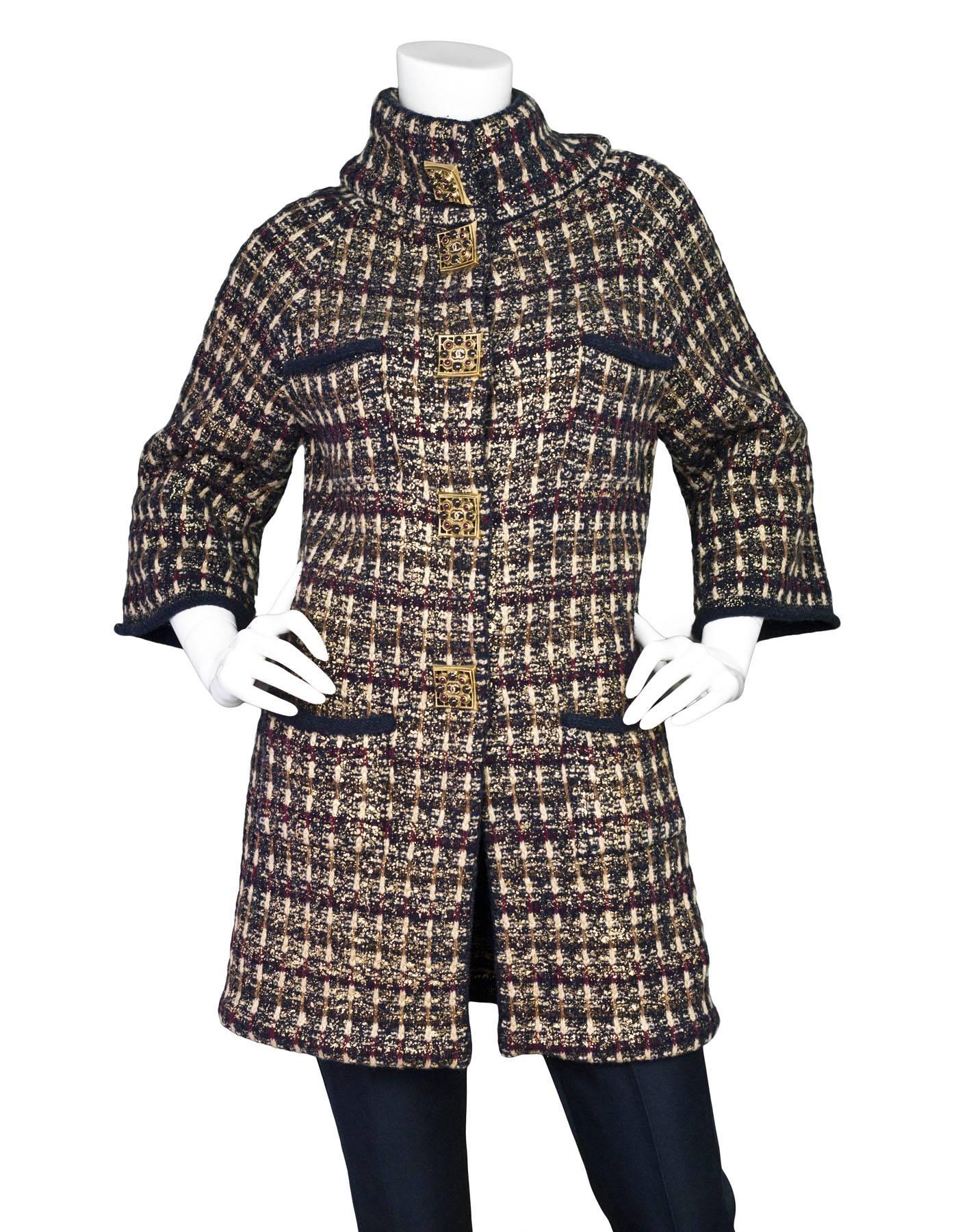 Chanel Wool & Cashmere Metiers d'Art Paris-Byzance Sweater Coat Sz FR38
Features gold detail throughout

Made In: Italy
Year of Production: 2011
Color: Black, gold, burgundy
Composition: 60% Wool, 40% Cashmere
Lining: None
Closure/Opening: Snap