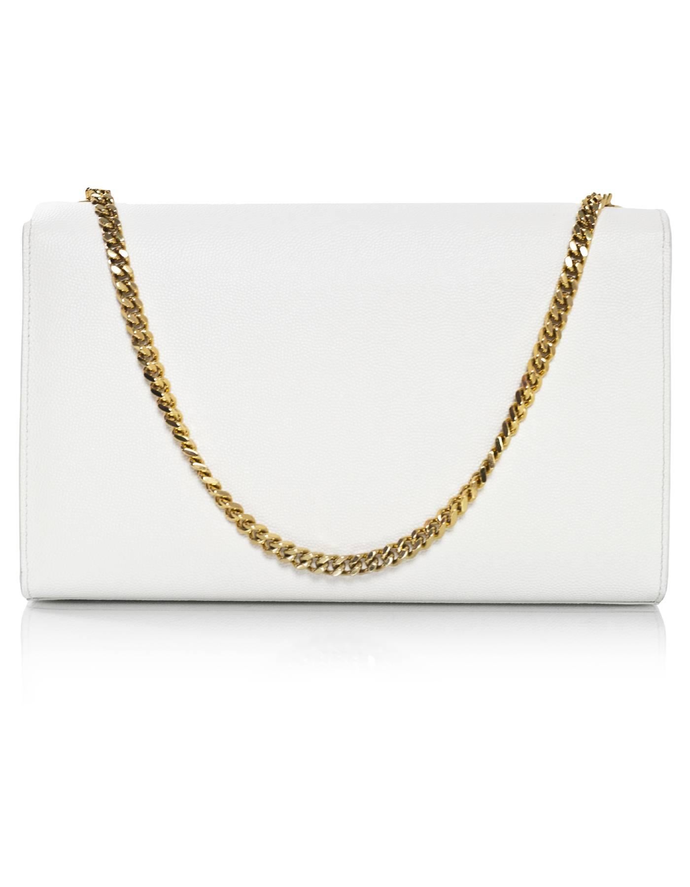 Saint Laurent Grain De Poudre Medium Classic Monogram Kate Bag
Features adjustable shoulder strap

Made In: Italy
Color: Off-white
Hardware: Goldtone
Materials: Leather 
Lining: Black grosgrain
Closure/Opening: Flap top with magnetic snap