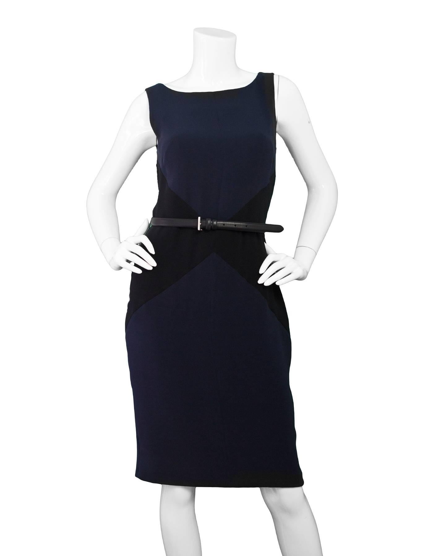 Christian Dior Navy & Black Silk Sheath Dress Sz 6

Made In: Italy
Color: Navy, black
Composition: 95% silk, 5% Elasthan
Lining: Black silk
Closure/Opening: Zip closure at back
Exterior Pockets: None
Interior Pockets: None
Overall Condition: