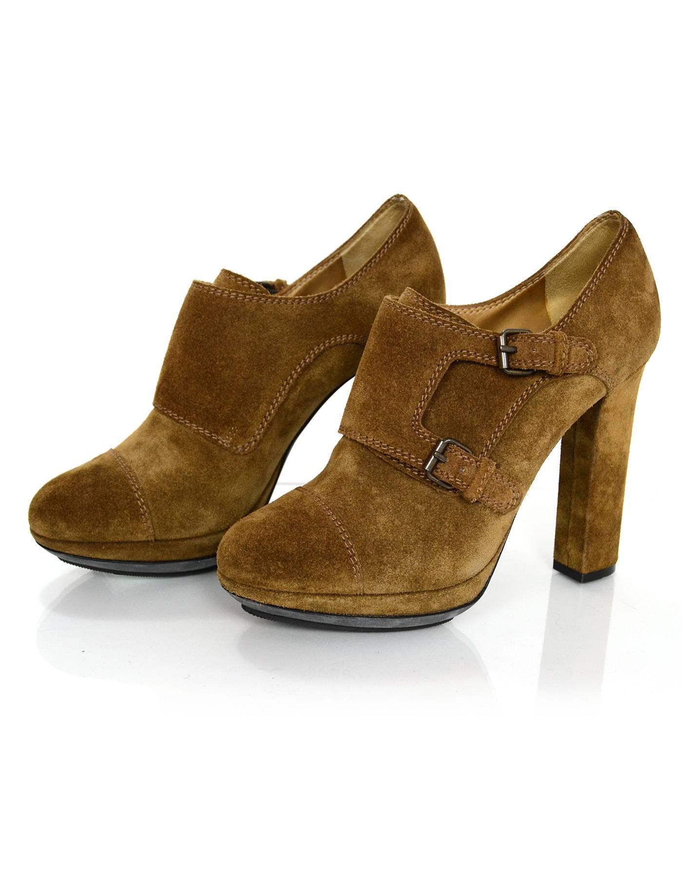 Lanvin Tan Suede Booties Sz 37

Made In: Italy
Color: Tan
Materials: Suede
Closure/Opening: Buckles at vamp
Sole Stamp: Vero cuoio made in italy 37
Overall Condition: Excellent pre-owned 

Marked Size: 37
Heel Height: 4.25"
Platform: .5"
