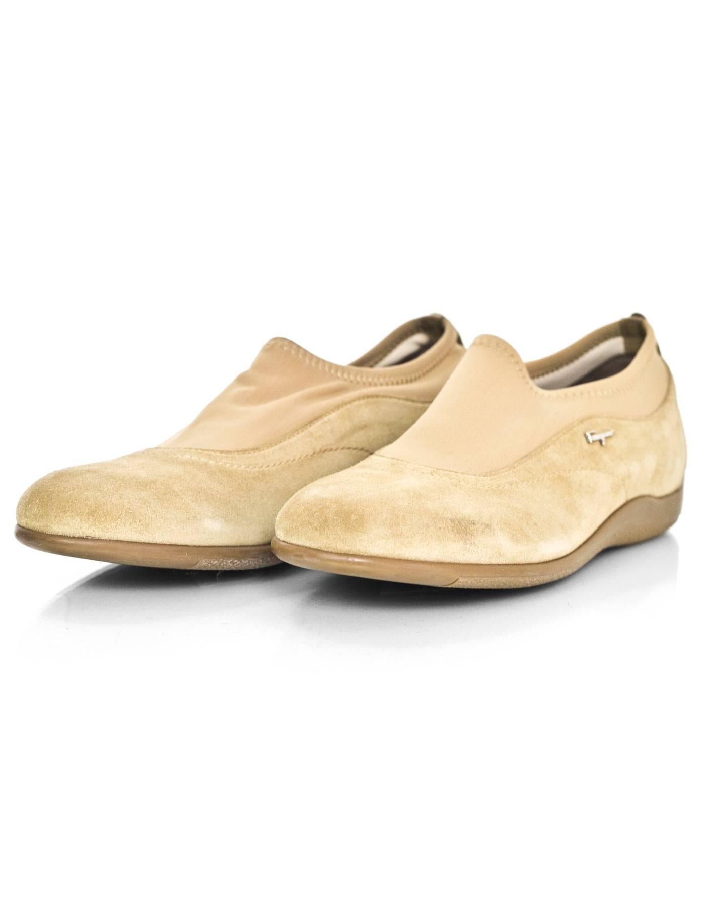 Salvatore Ferragamo Tan Suede Shoes Sz 37

Made In: Italy
Color: Tan
Materials: Suede
Closure/Opening: Slide on with stretch elastic foot opening
Sole Stamp: Salvatore Ferragamo Sport Made in Italy
Overall Condition: Excellent pre-owned condition