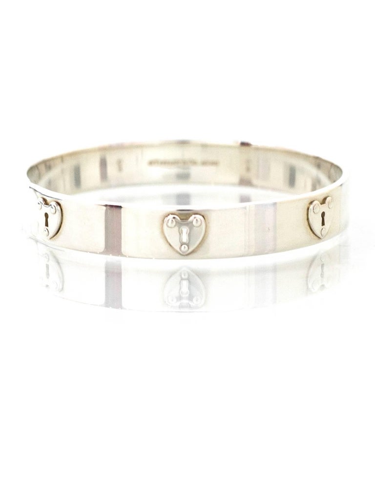 Tiffany and Co. Sterling Heart Lockett Bangle Sz S with DB at 1stDibs