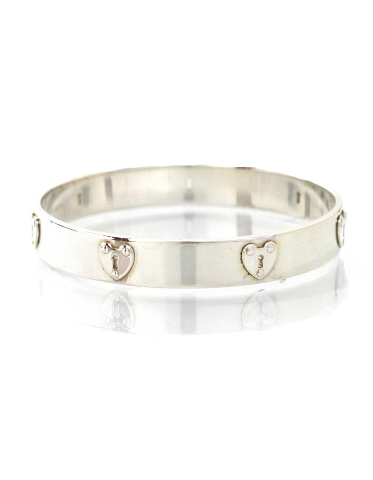 Tiffany and Co. Sterling Heart Lockett Bangle Sz S with DB at 1stDibs