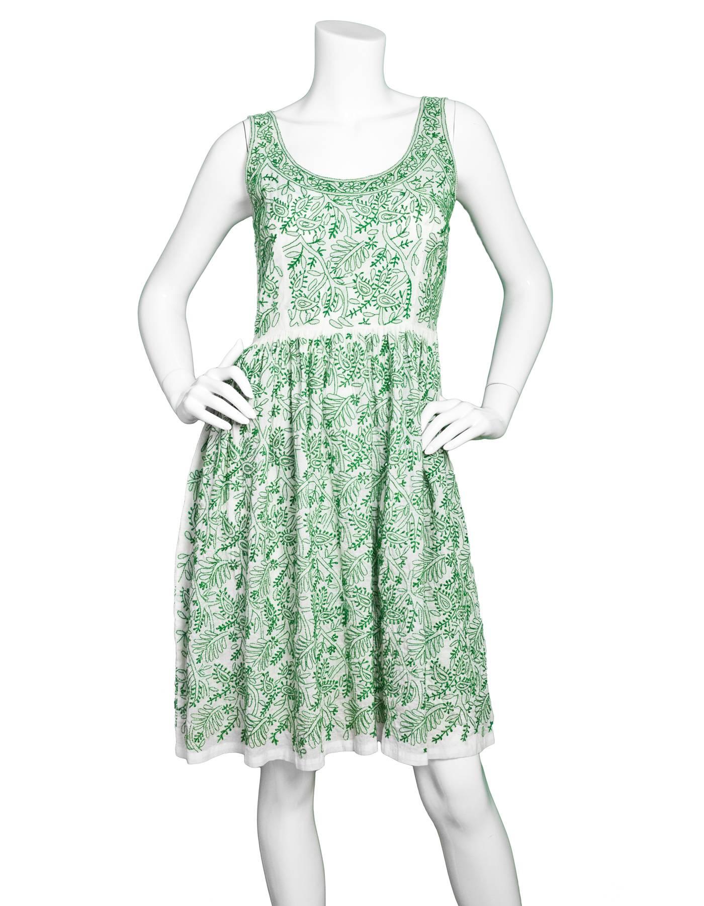 Prada White & Green Embroidered Cotton Sleeveless Dress 
Features floral design embroidered throughout

Made In: India
Color: White and green
Composition: Not given- believed to be 100% cotton
Lining: None
Closure/Opening: Side zipper 
Exterior