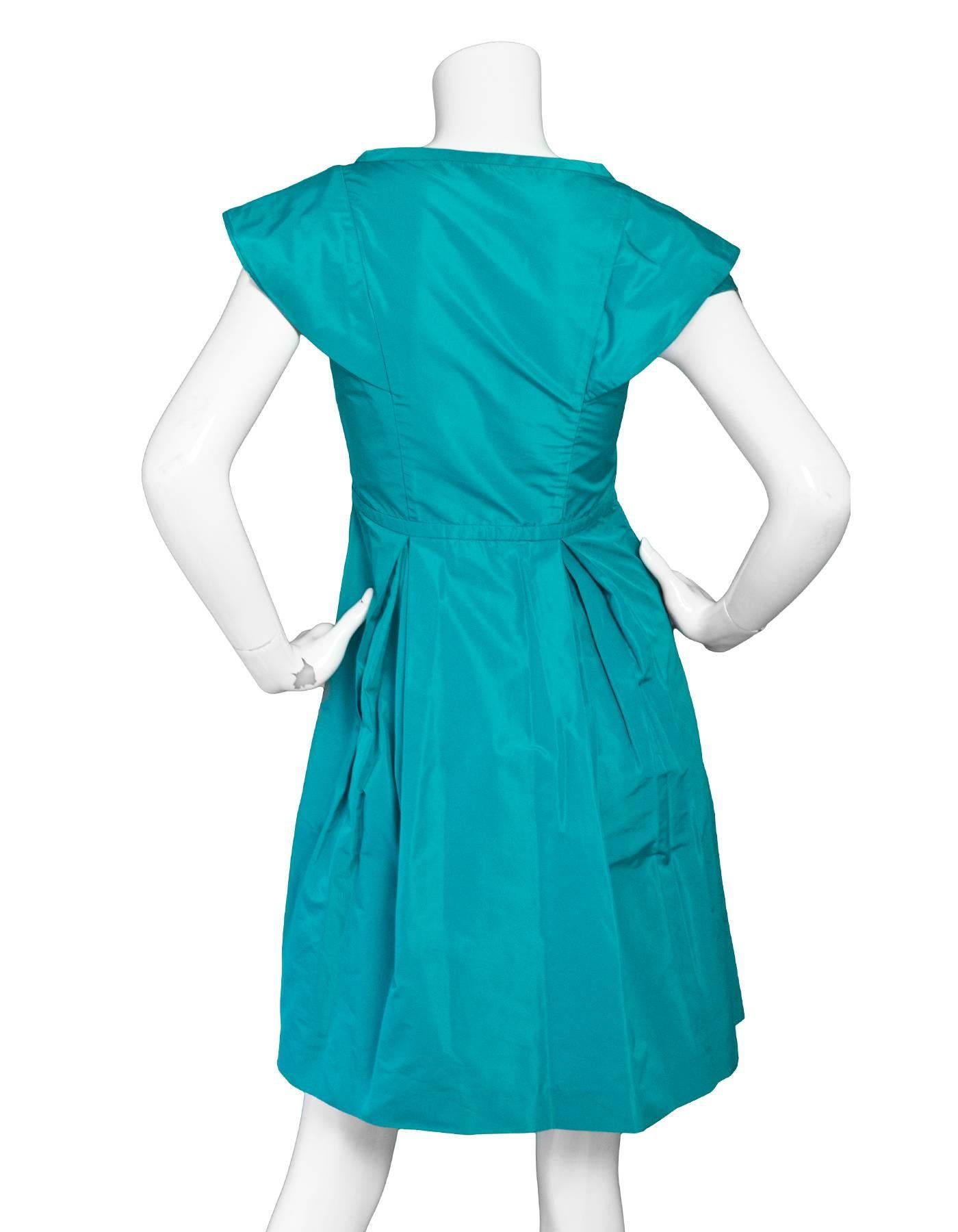 turquoise pleated dress