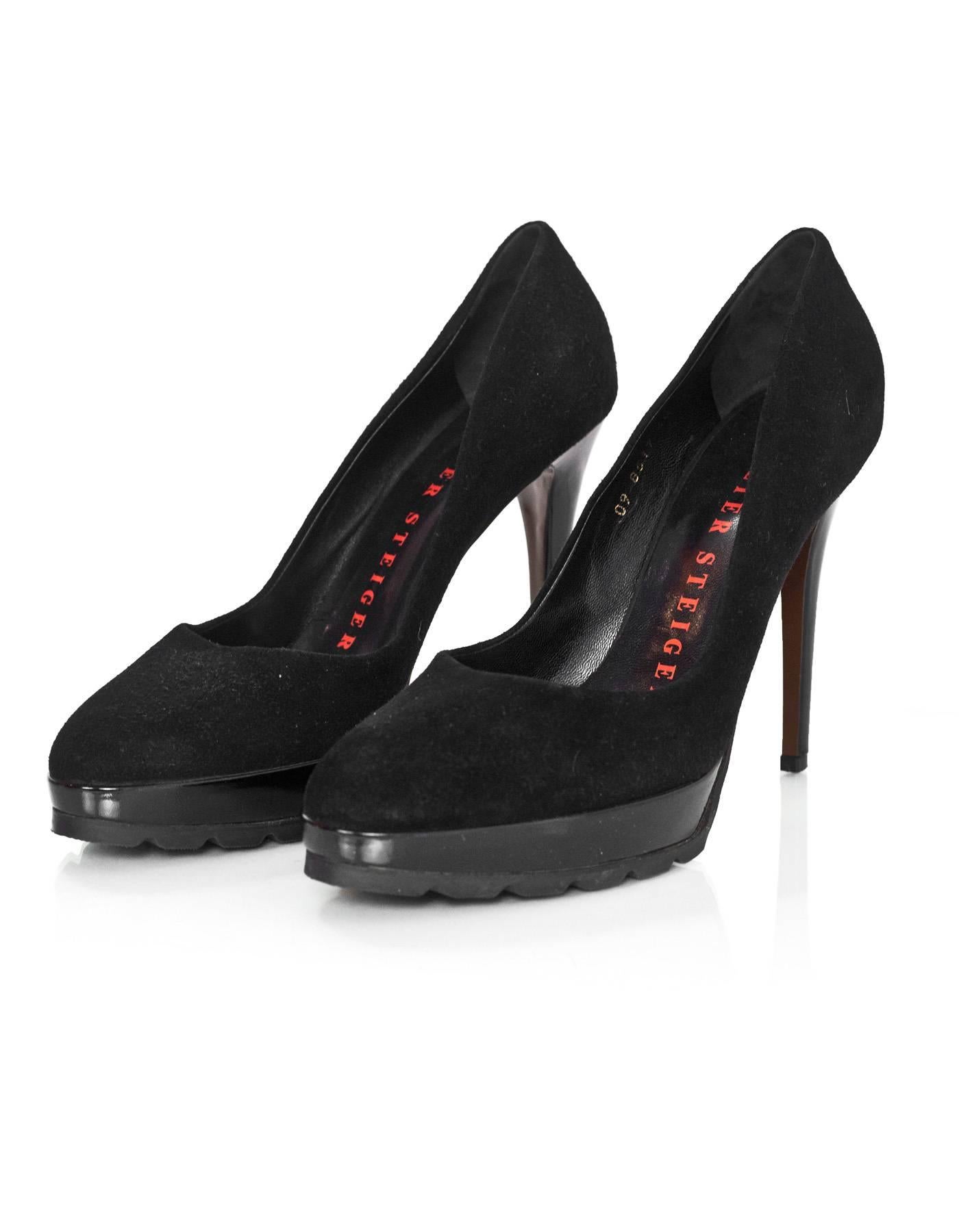 Walter Steiger Black Suede Platform Pumps
Features traction pad to soles and patent covered platform and heel

Made In: Italy
Color: Black
Materials: Suede 
Closure/Opening: Slip on
Sole Stamp: Walter Steiger Hand Mde in Italy 40
Overall Condition: