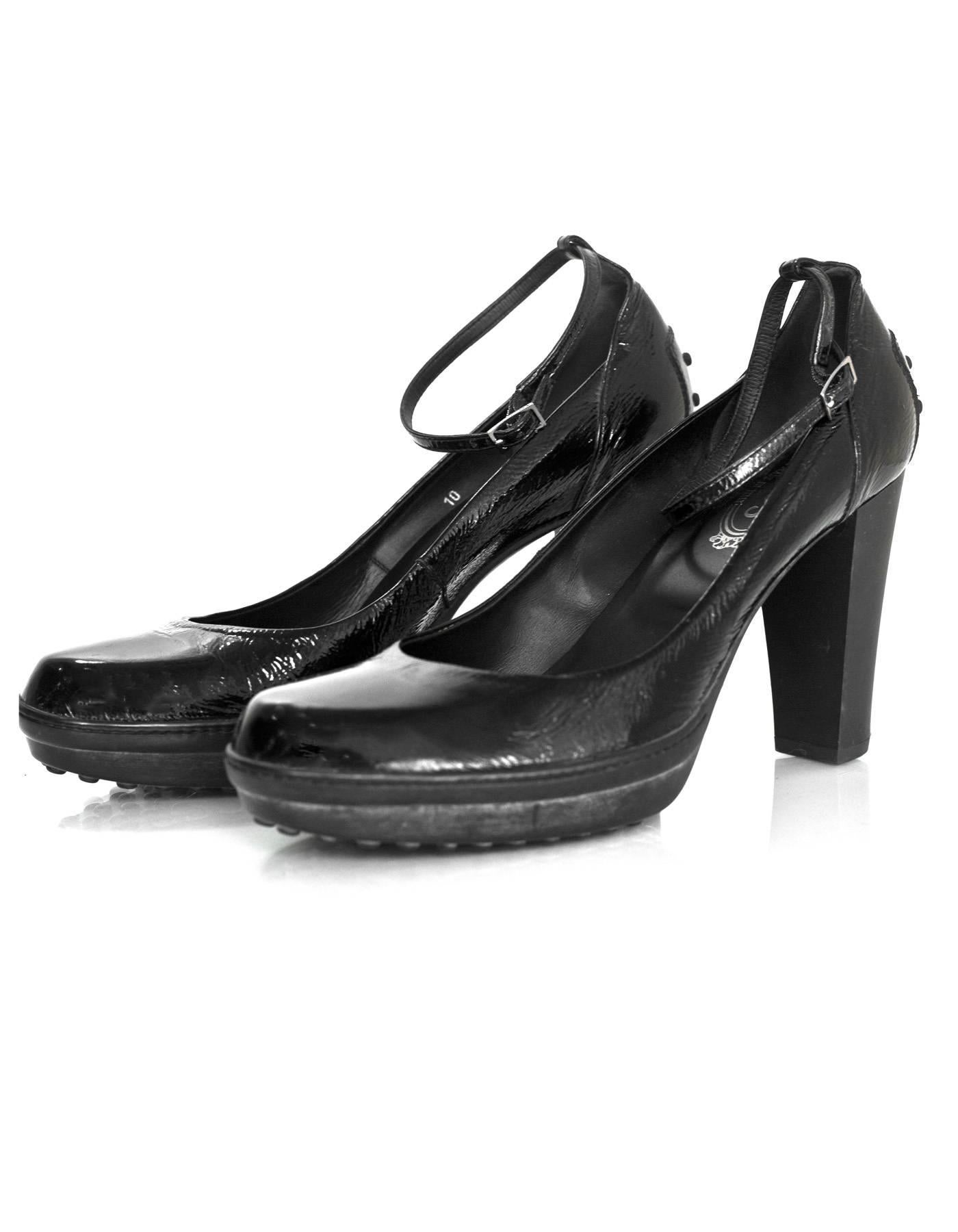 TOD's Black Patent Ankle Strap Pumps 
Features distressed patent leather

Made In: Italy
Color: Black
Materials: Patent leather
Closure/Opening: Ankle strap with buckle
Sole Stamp: TODS
Overall Condition: Very good pre-owned condition with the