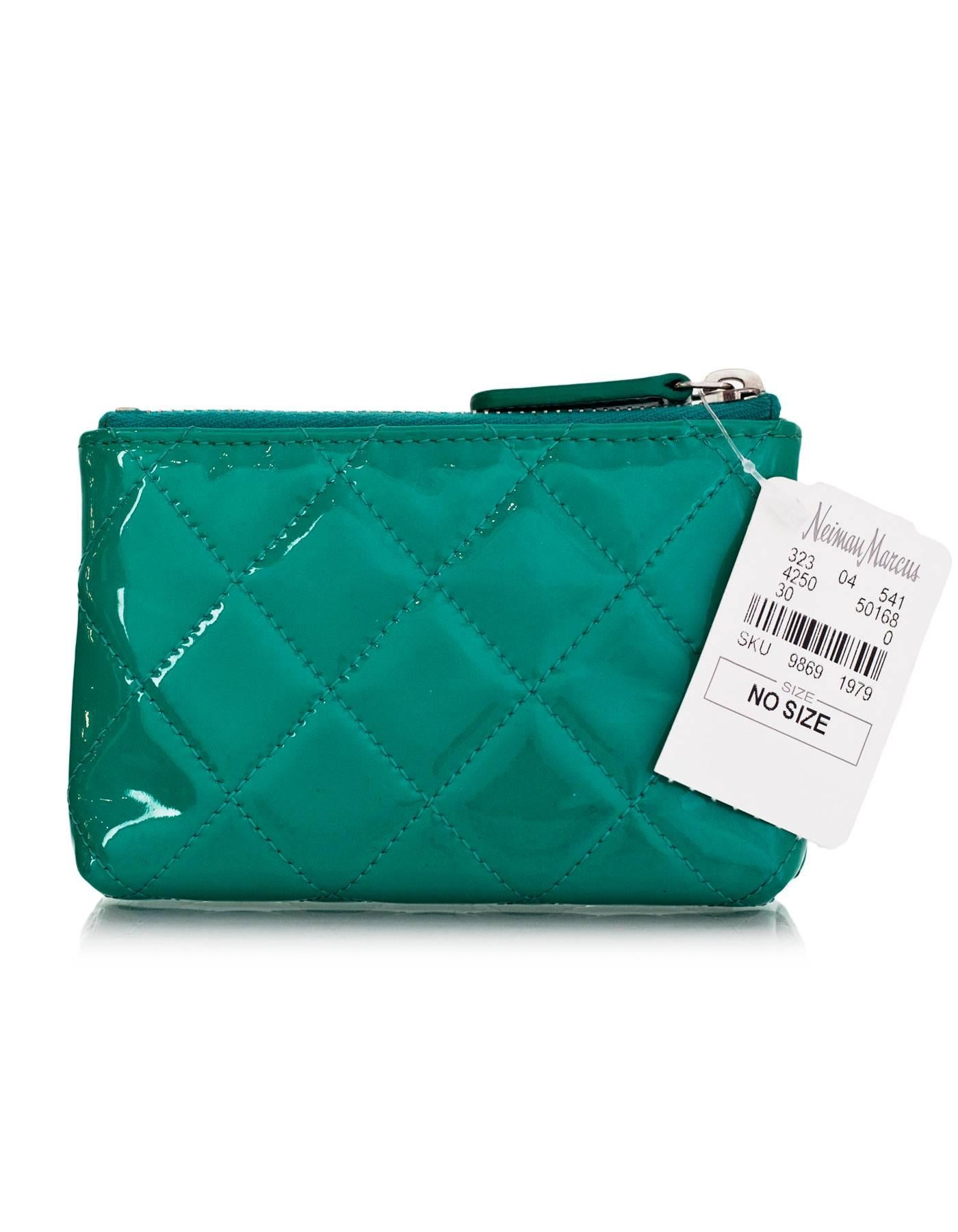 Chanel Turquoise Patent leather Quilted Card/Key Holder 
Features turquoise coated CC on front

Made In: Spain
Year of Production: 2012-2013
Color: Turquoise
Hardware: Silvertone
Materials: Patent leather
Lining: Turquoise grosgrain
Closure/Opening: