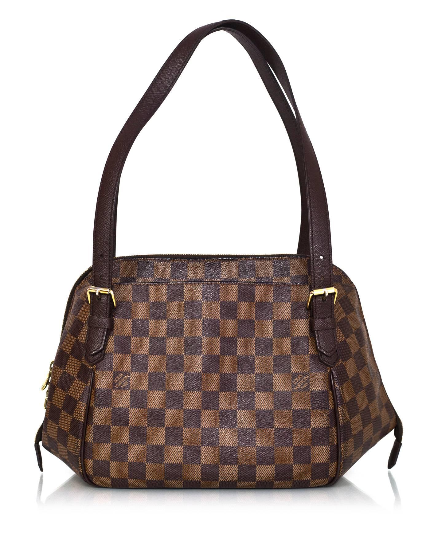 Louis Vuitton Damier Belem MM Shoulder Bag 
Features adjustable shoulder straps

Made In: France
Year of Production: 2005
Color: Brown
Hardware: Goldtone
Materials: Coated canvas
Lining: Rust colored canvas
Closure/Opening: Double zip around